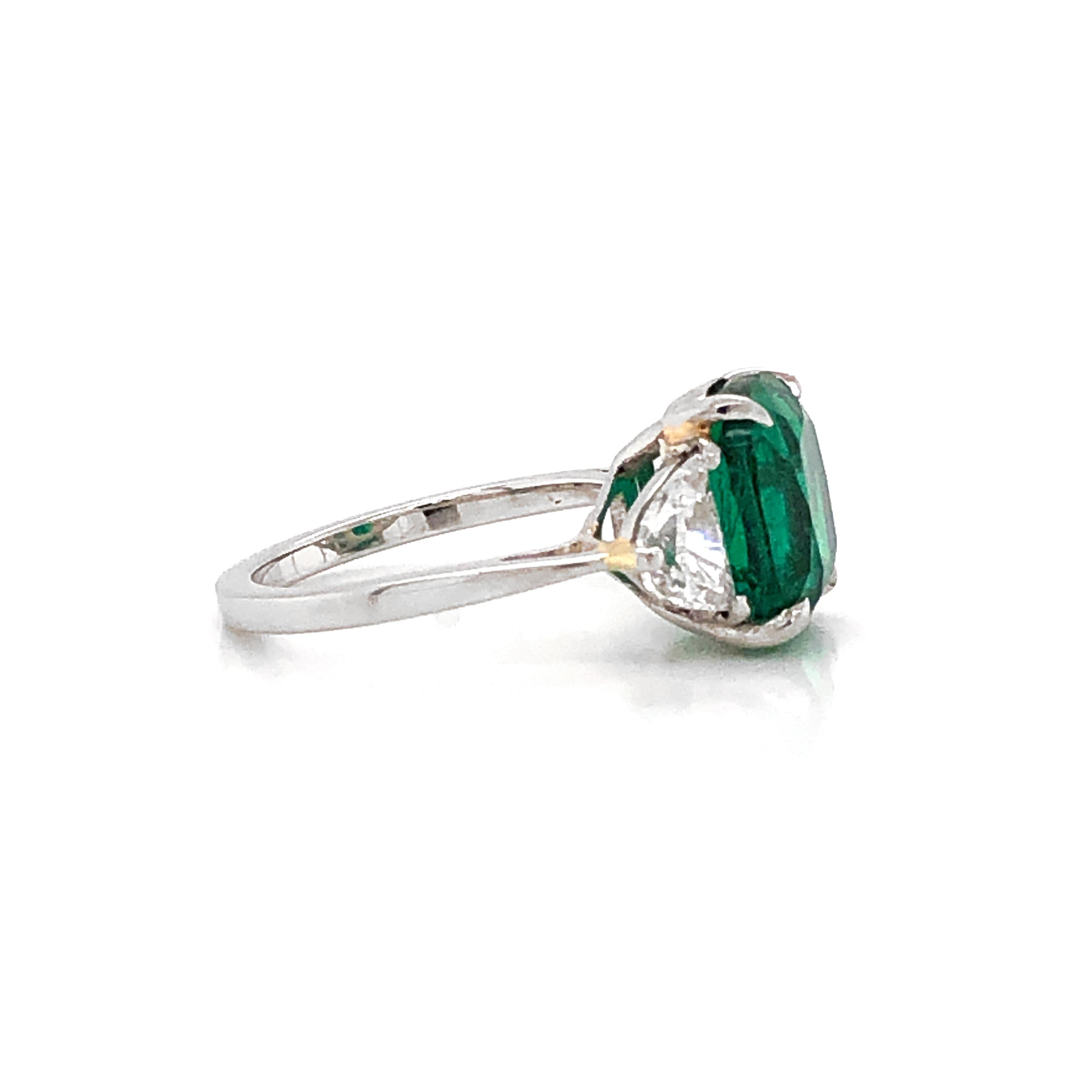 Contemporary Cushion Zambian Emerald 5.45 Carat Half Moon Diamond Platinum Ring