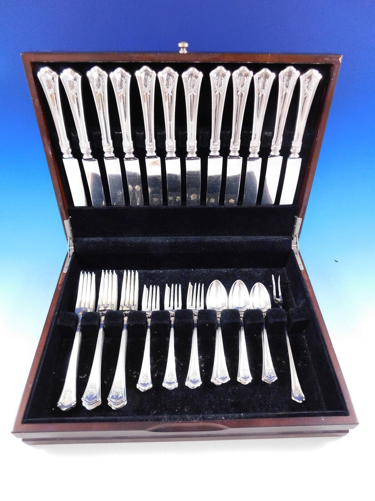 Rare dinner size Custis by Wallace, circa 1911, sterling silver Flatware set - 49 pieces. This set includes:
12 dinner size knives, 9 7/8