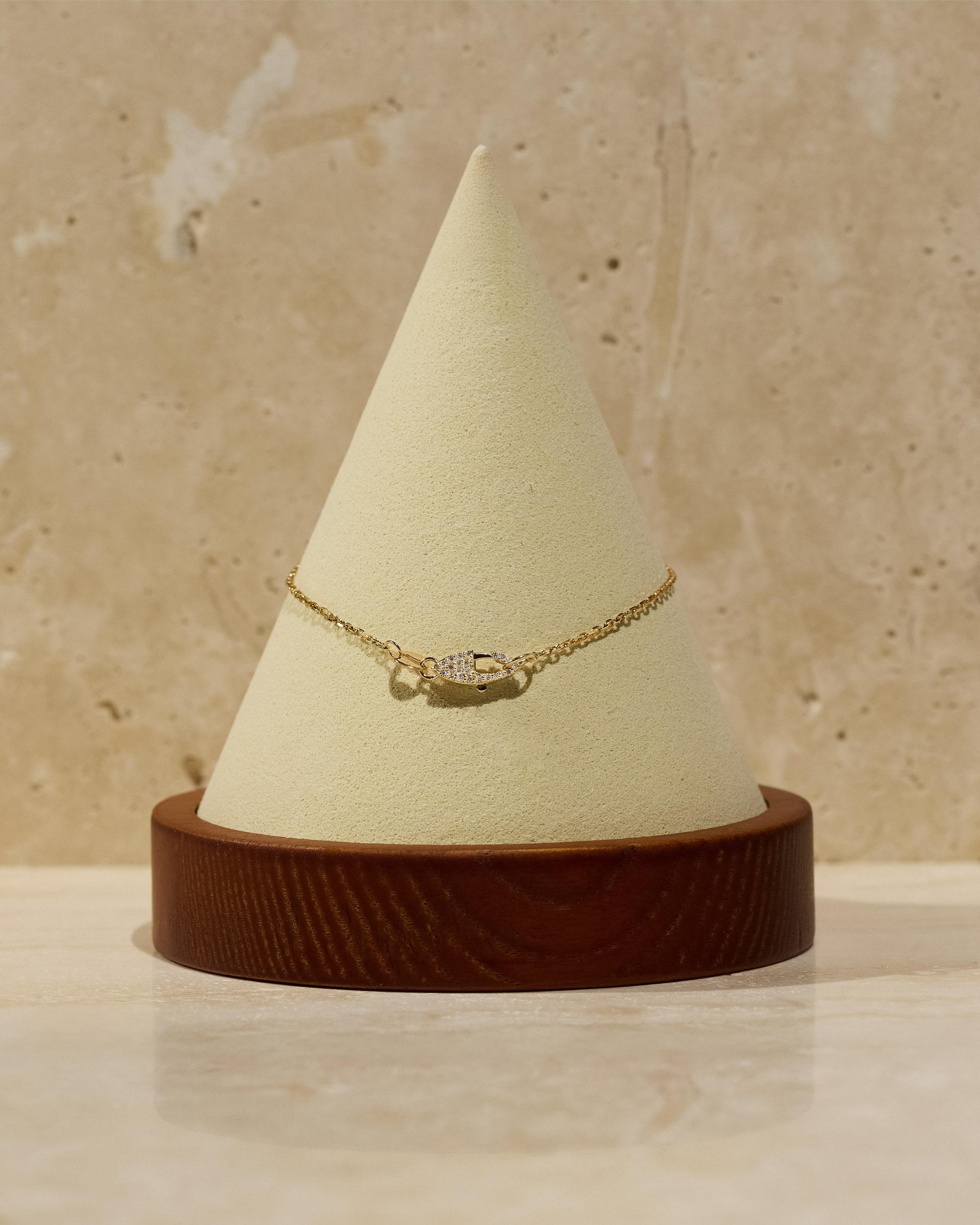 Due to popular request, our signature 14k double-sided natural diamond clasp is now available as a standalone piece. Thoughtfully crafted to elevate your most cherished necklaces, this exquisite clasp can be effortlessly attached using a simple jump