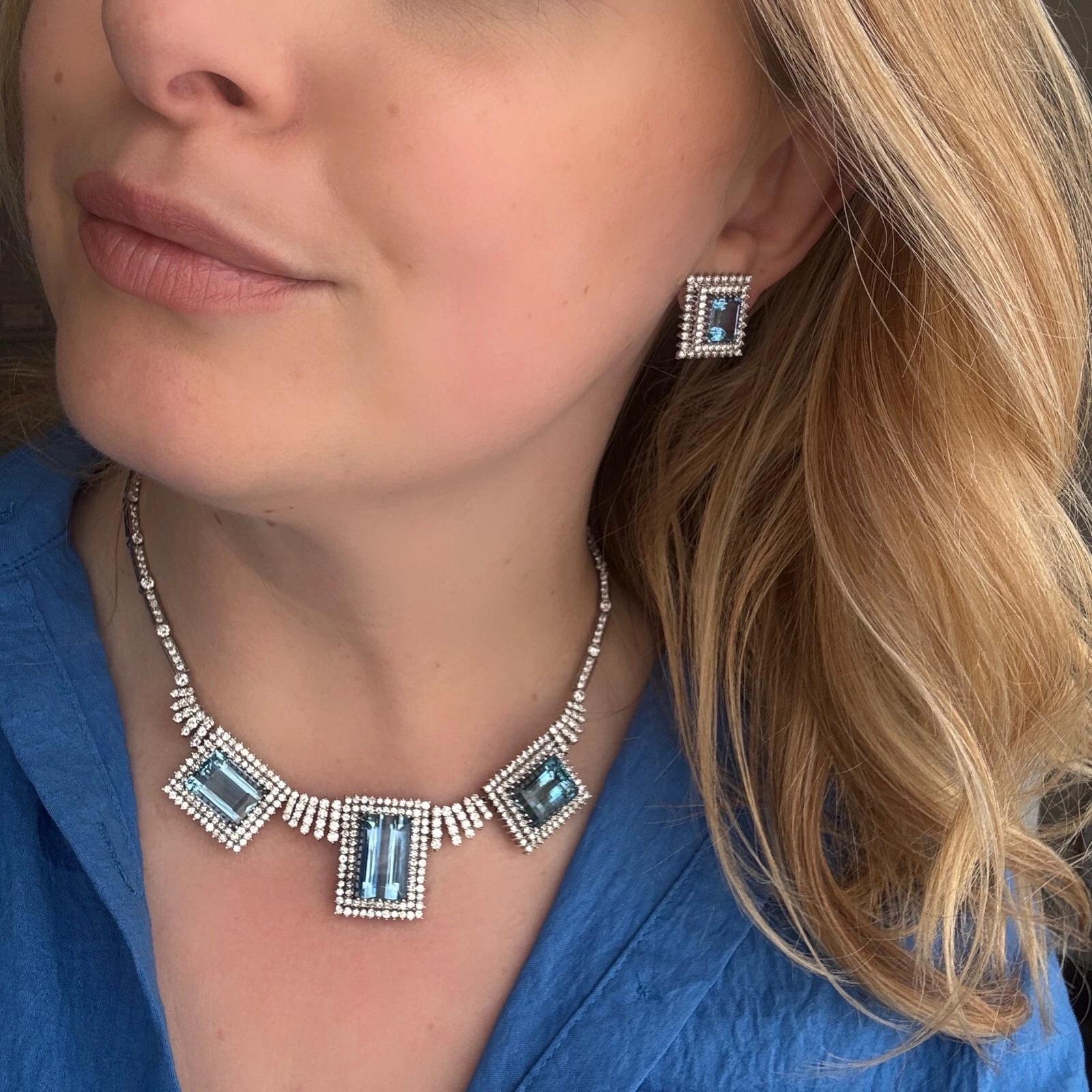 Offered is a stunning, one-of-a-kind fine jewelry suite featuring richly saturated aquamarine gemstones and precision-set diamonds in handcrafted 14K white gold. Custom-made on commission for a private client, this set includes a showstopping