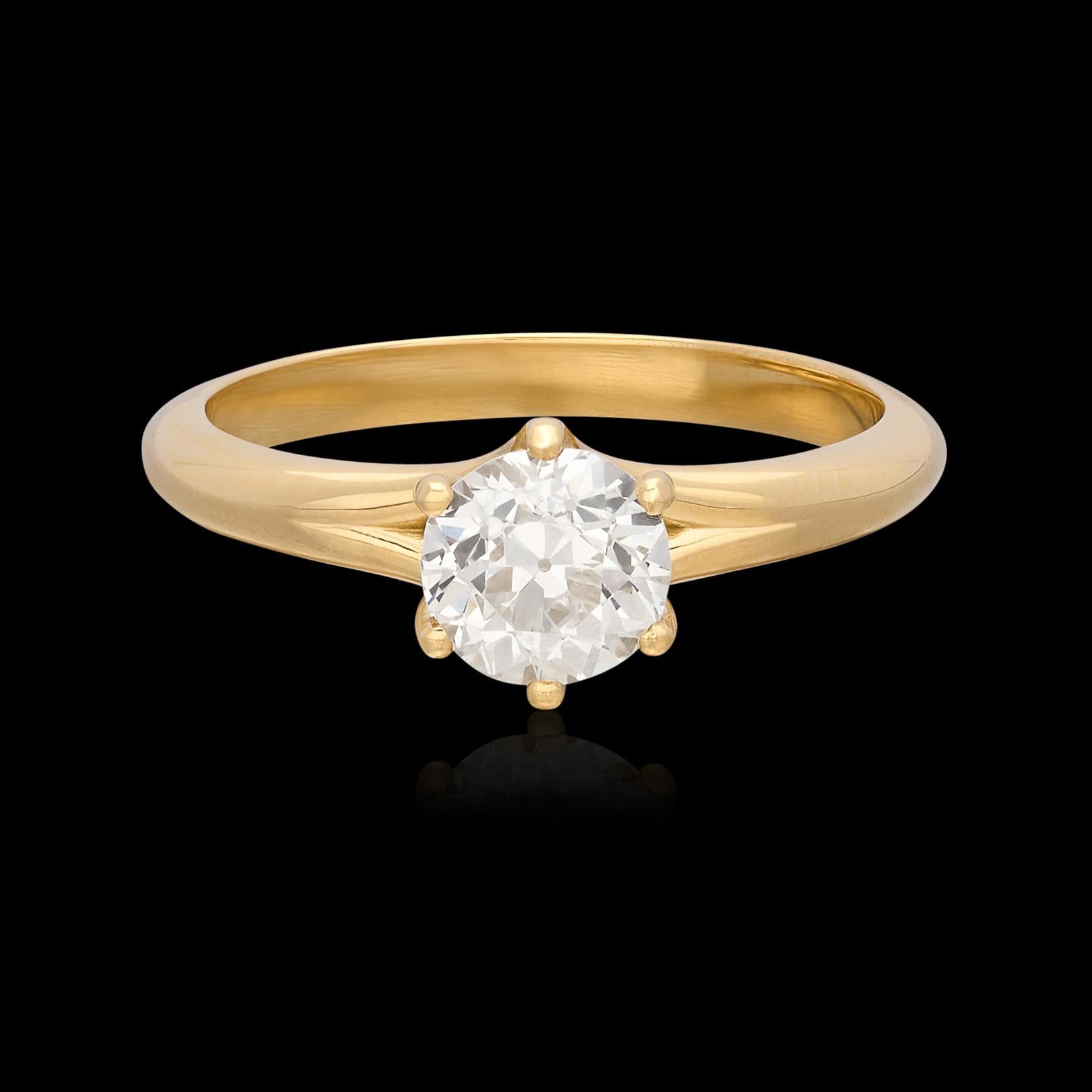 Old meets new in this custom 18 karat yellow gold engagement ring featuring a GIA graded Old Euro Cut Diamond. The twist basket design perfectly showcases the antique solitaire diamond in a simple but stunning 6-prong setting with split shank. The