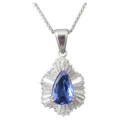 Collier vintage avec pendentif en or blanc 14 carats, orné d'une tanzanite de 5,55 carats et de diamants