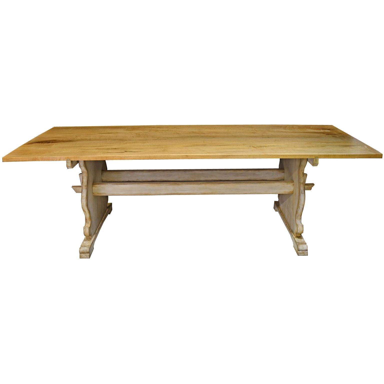 Inspired by an 18th century Swedish-Gustavian table that is in our inventory, this very handsome and solidly-built dining table was fabricated in our workshop. Table may be purchased with a maple, walnut or cherry top. The top, as shown in main