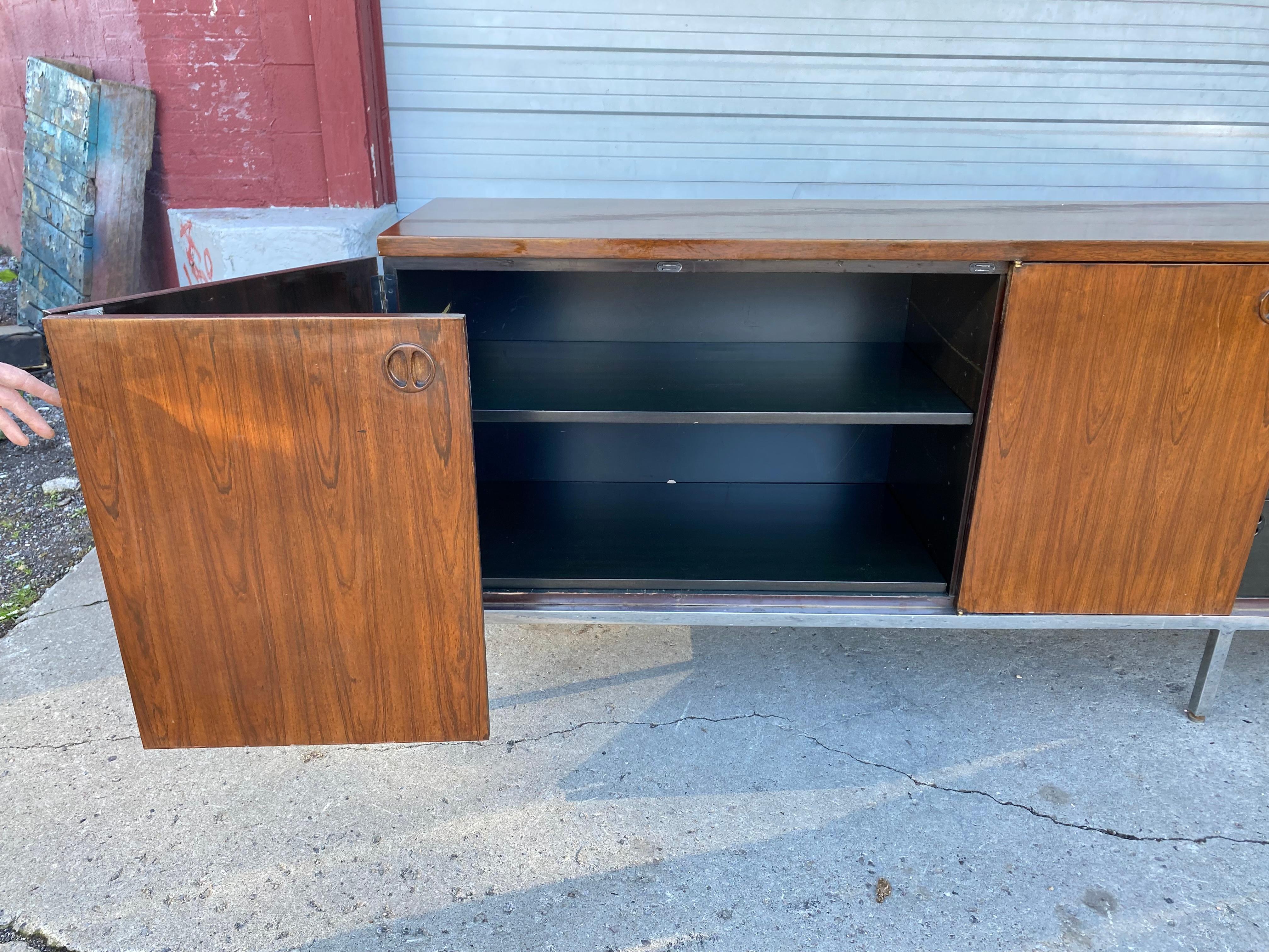 Custom Harvey Probber Rosewood / Lacquer and Steel Bi-Fold Door Cabinet In Good Condition For Sale In Buffalo, NY