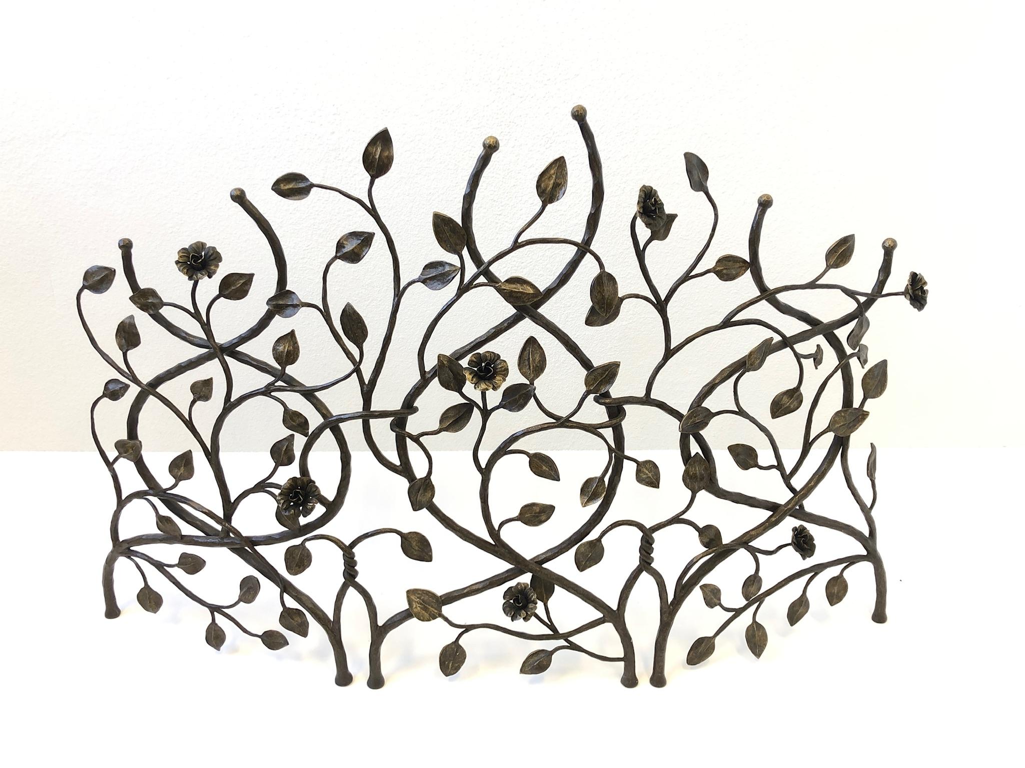 A beautiful custom forge steel fireplace screen, designed by Thomas Schwaiger in 1999.
It depicts intertwined vines with leaves and flowers. Constructed of forge steel with a bronze finish.
Stampt Schwaiger 1999.
Measurements: 36” high, 55.5”