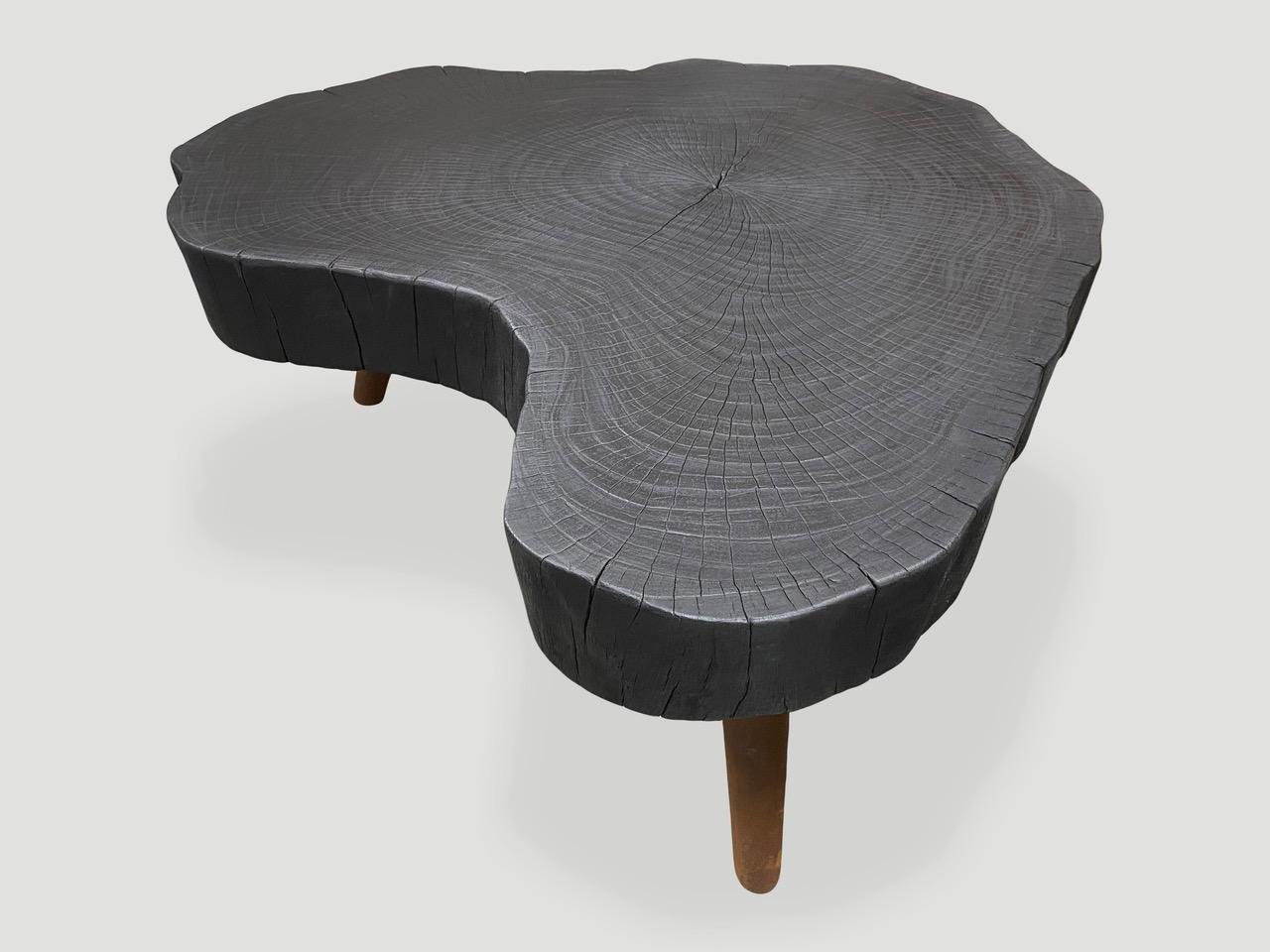 Charred coffee table with charred wood legs ;  44