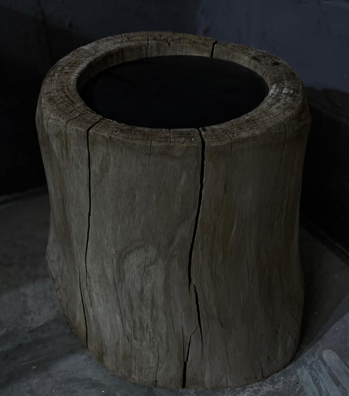 This Japanese side table is composed of an antique base made from an ancient Japanese Zelkova wood Usu . The natural texture and patina give this piece an earth feel that one can usually only find in nature. The piece is completed off by a new wood