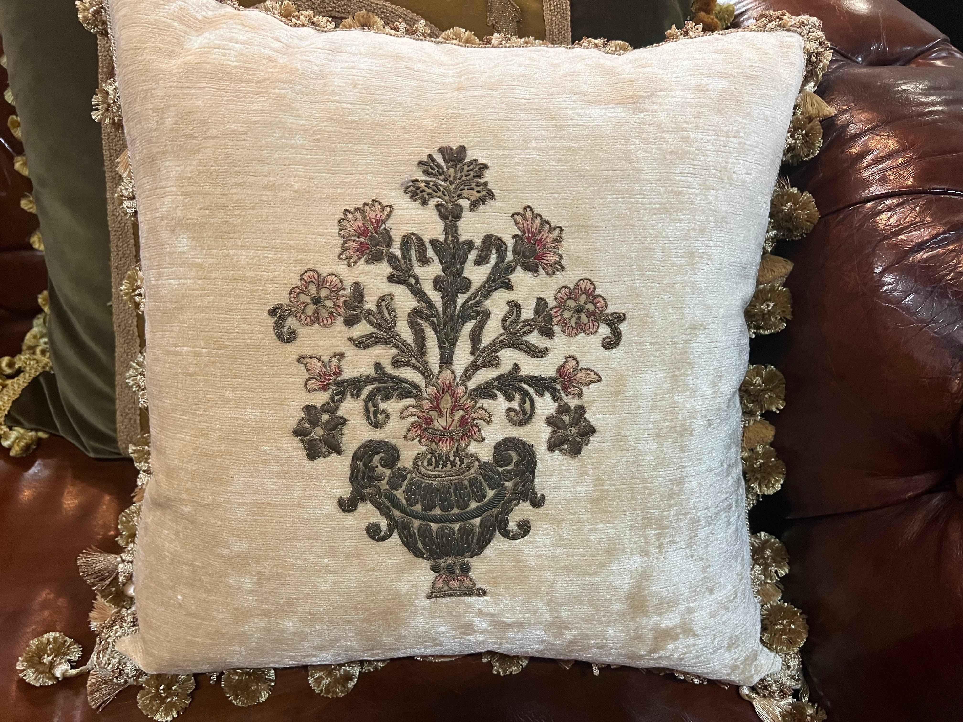 Custom pillows using part of client's original pillows.  We will hand sew 19th century appliques on new fabric and incorporate with client's border fabric.  Down inserts. Zipper closures.