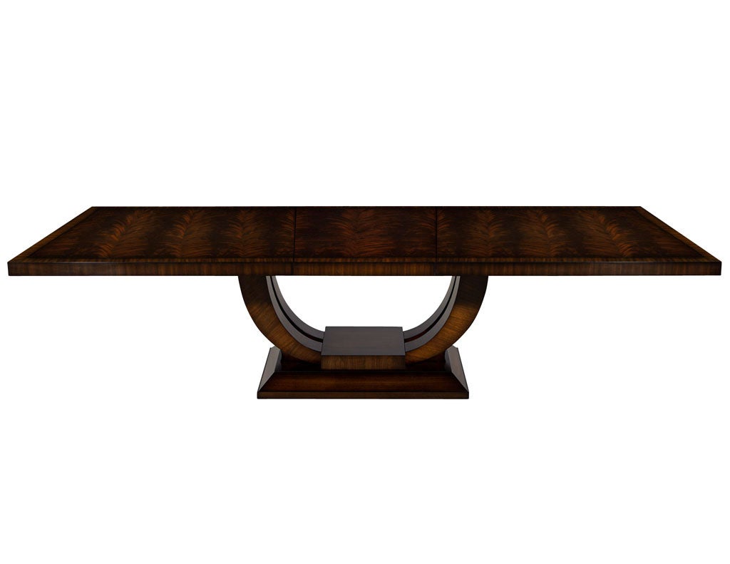 Custom Art Deco Inspired Mahogany Dining Table with Rosewood Banding. Custom designed and hand crafted by the Carrocel artisans here in Toronto, Canada, using only the finest materials and techniques available. Featuring stunning book-matched