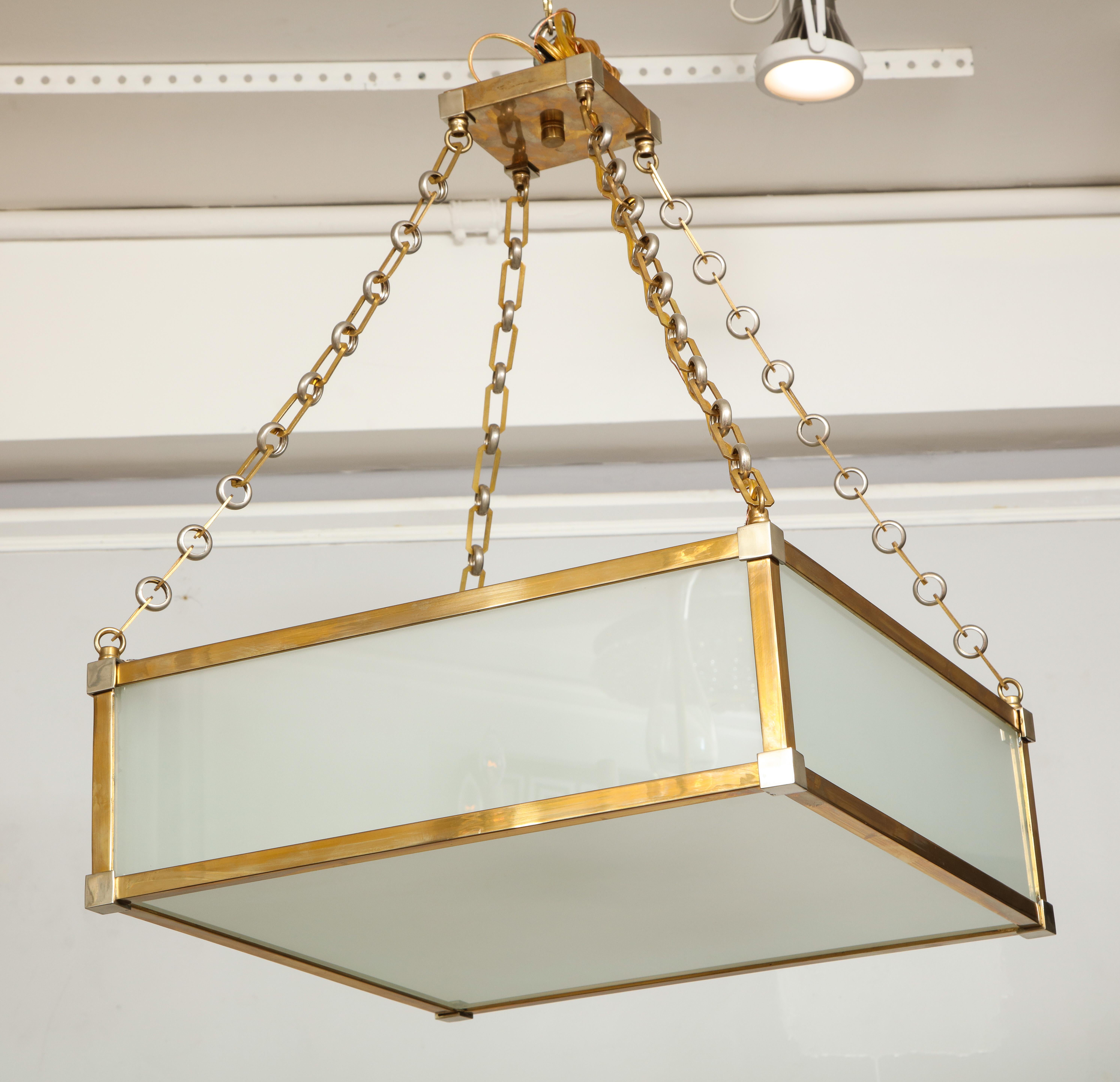 Custom Art Deco style nickel and brass-plated pendant fixture. Please note that this fixture is customizable. It can be made in different sizes and finishes.
Lead Time is 8-10 weeks.