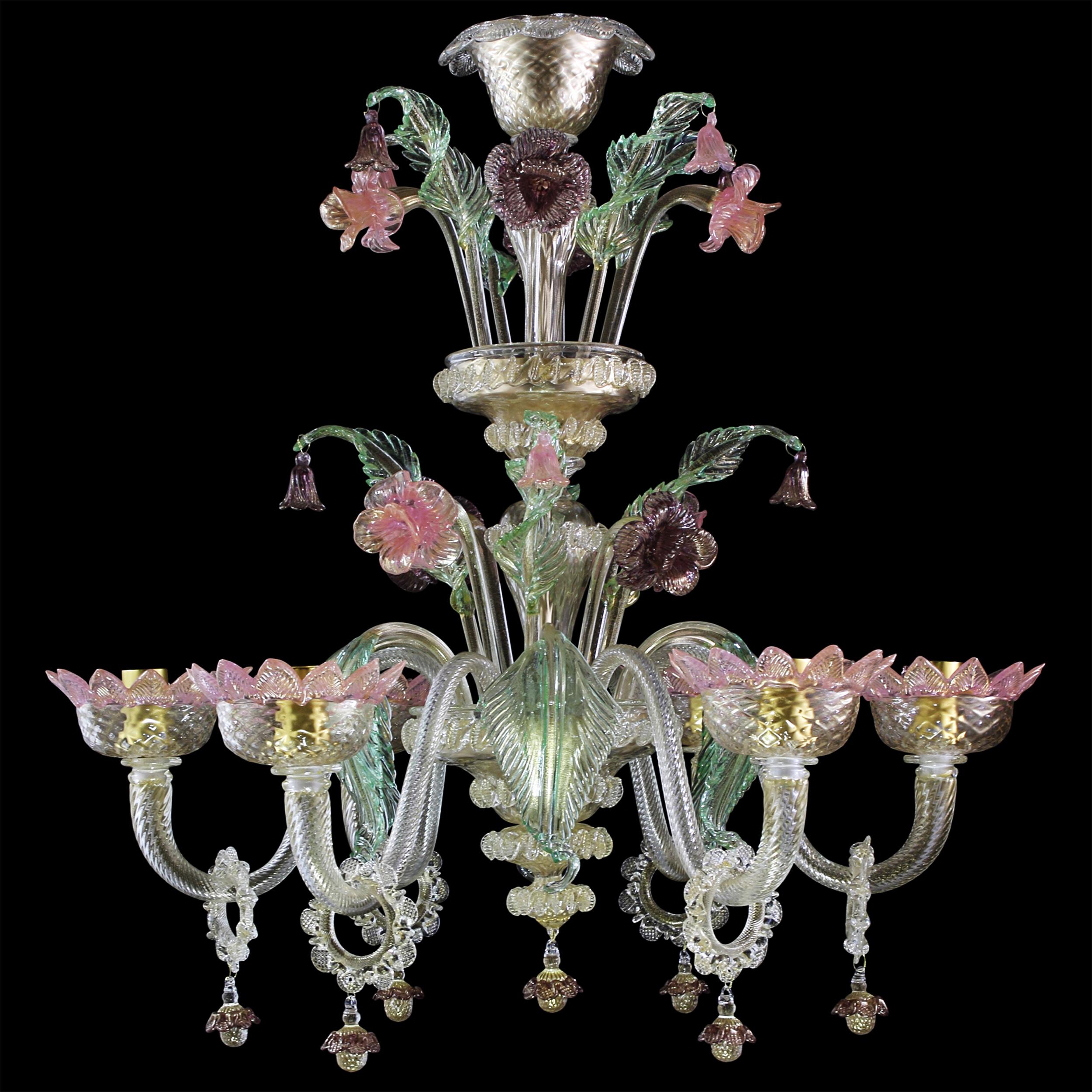This chandelier has 6 Arms in gold Glass while the details are in pink, green and amethyst.
The handcrafted soul of our lighting products is reinvented every time we start a new project, when we are confronted with technical requirements and