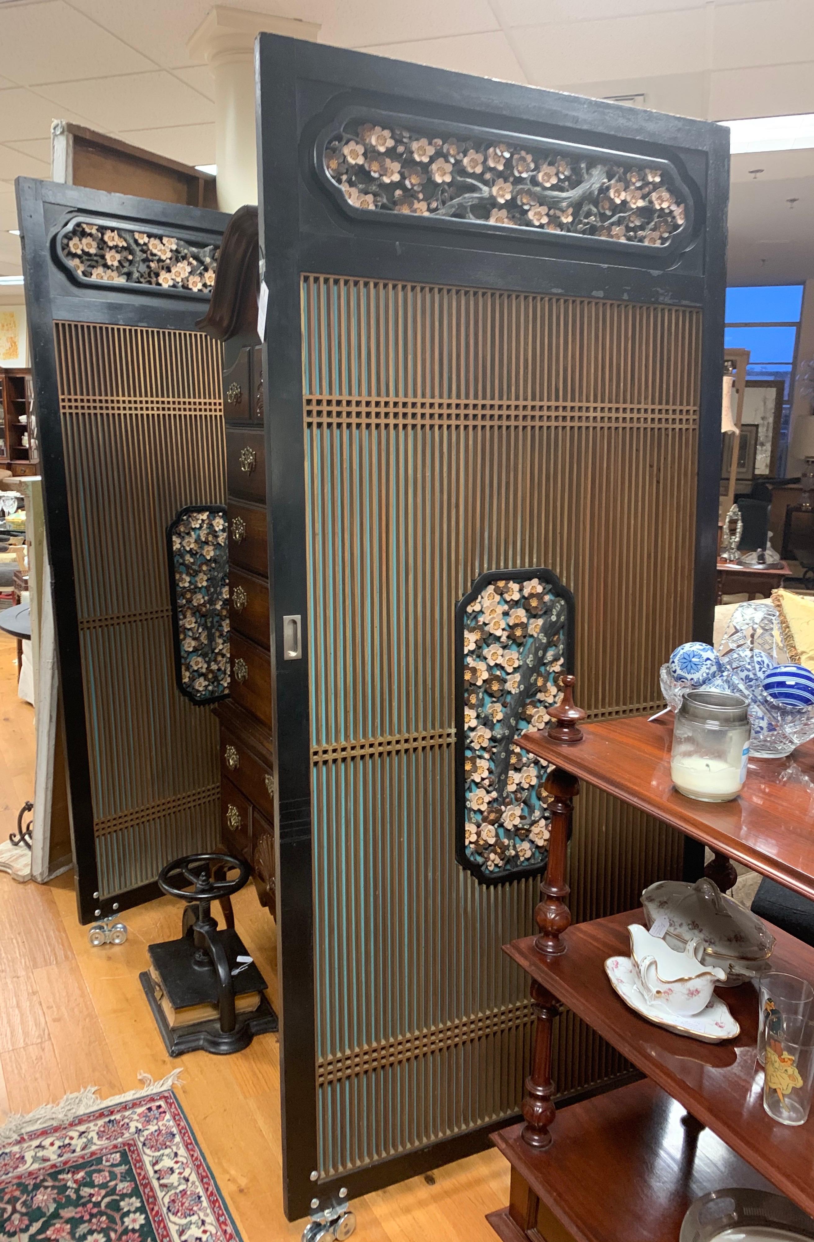 Stunning pair of custom made Japanese Shoji laquered sliding doors with casters on bottom for ease of opening and closing. From a Darien, CT architectural gem, this is not your run of the mill sliding barn door set.
Please look closely at intricate