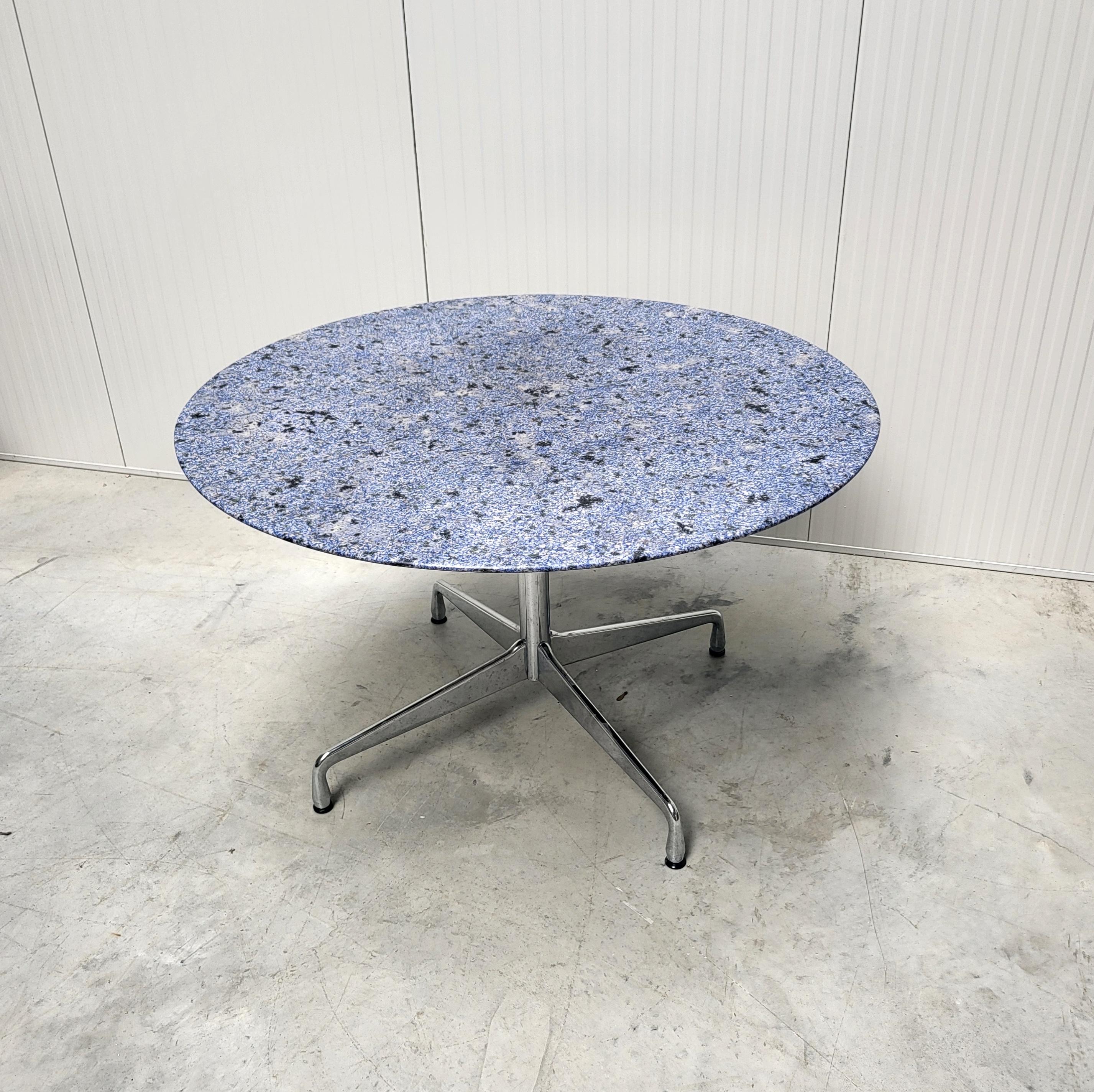 Fine and very nice custom order office / dining table by Charles Eames for Vitra.

The table was a custom order made with an amazing Azul Bahia stone top which has an amazing structure.
Never seen before with this kind of top!

The blue Azul Bahia
