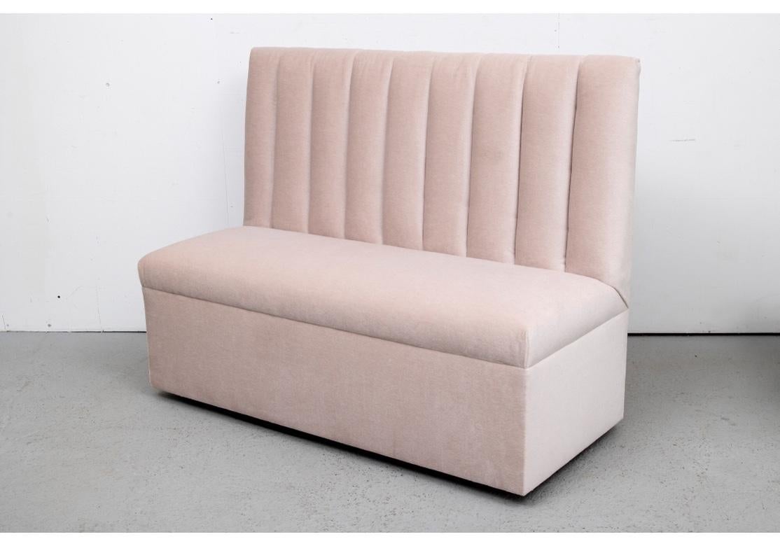 With a channel tufted high back and no arms. Upholstered in Old World Weavers 100% Cotton Inuit Mohair Agneau Fabric. Comfortable and good looking. 
Measures: H. 43 1/2
