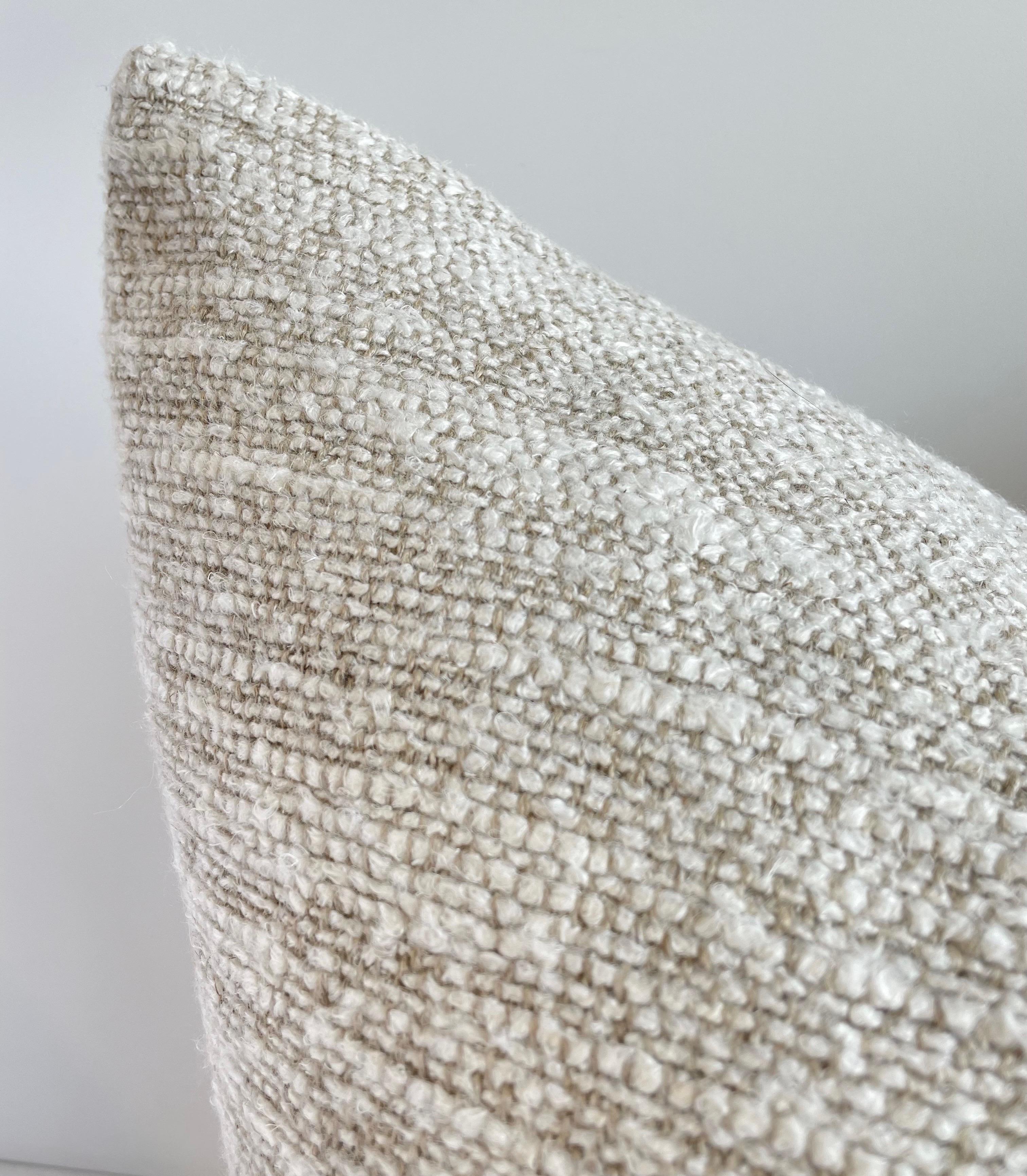 Woven in Belgium using traditional weaving techniques, Bloom Home Inc Nasha features a Belgian Linen warp and alternating Belgian Linen/Mixed Fiber weft. Fringe details are limited editions made from our weaving salvage. Includes insert.  If this