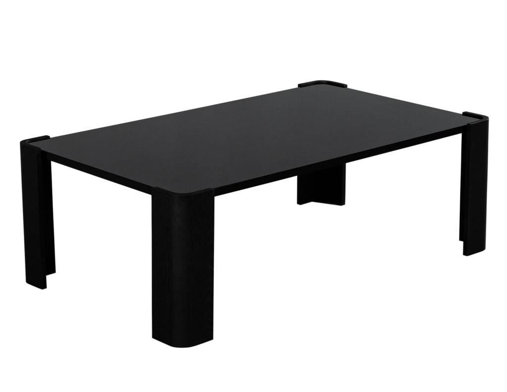 Custom Black Lacquered Cerused oak coffee table. Sleek modern design with polished black lacquer top. Accented with black cerused oak legs. Price includes complimentary curb side delivery to the continental USA.