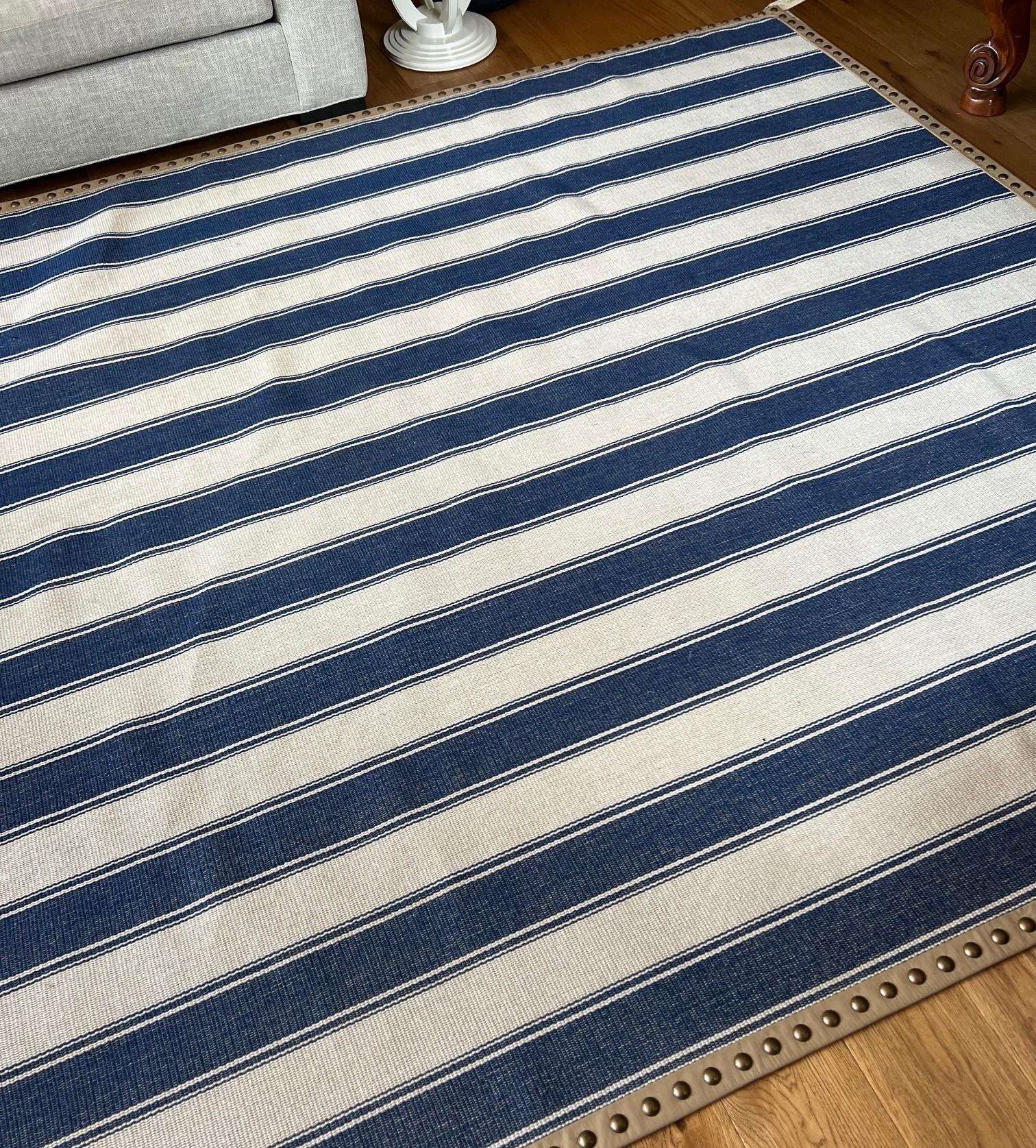 American Custom Blue and Beige Striped Kilim Edged With Faux Leather and Brass Trim For Sale
