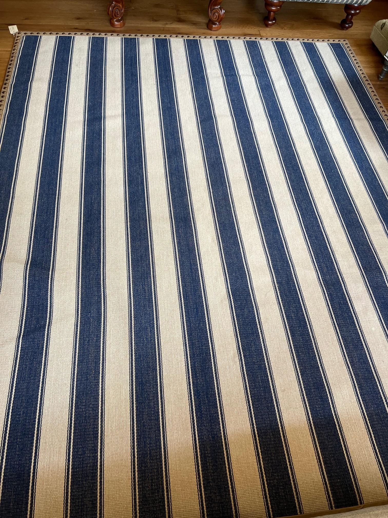 Woven Custom Blue and Beige Striped Kilim Edged With Faux Leather and Brass Trim For Sale