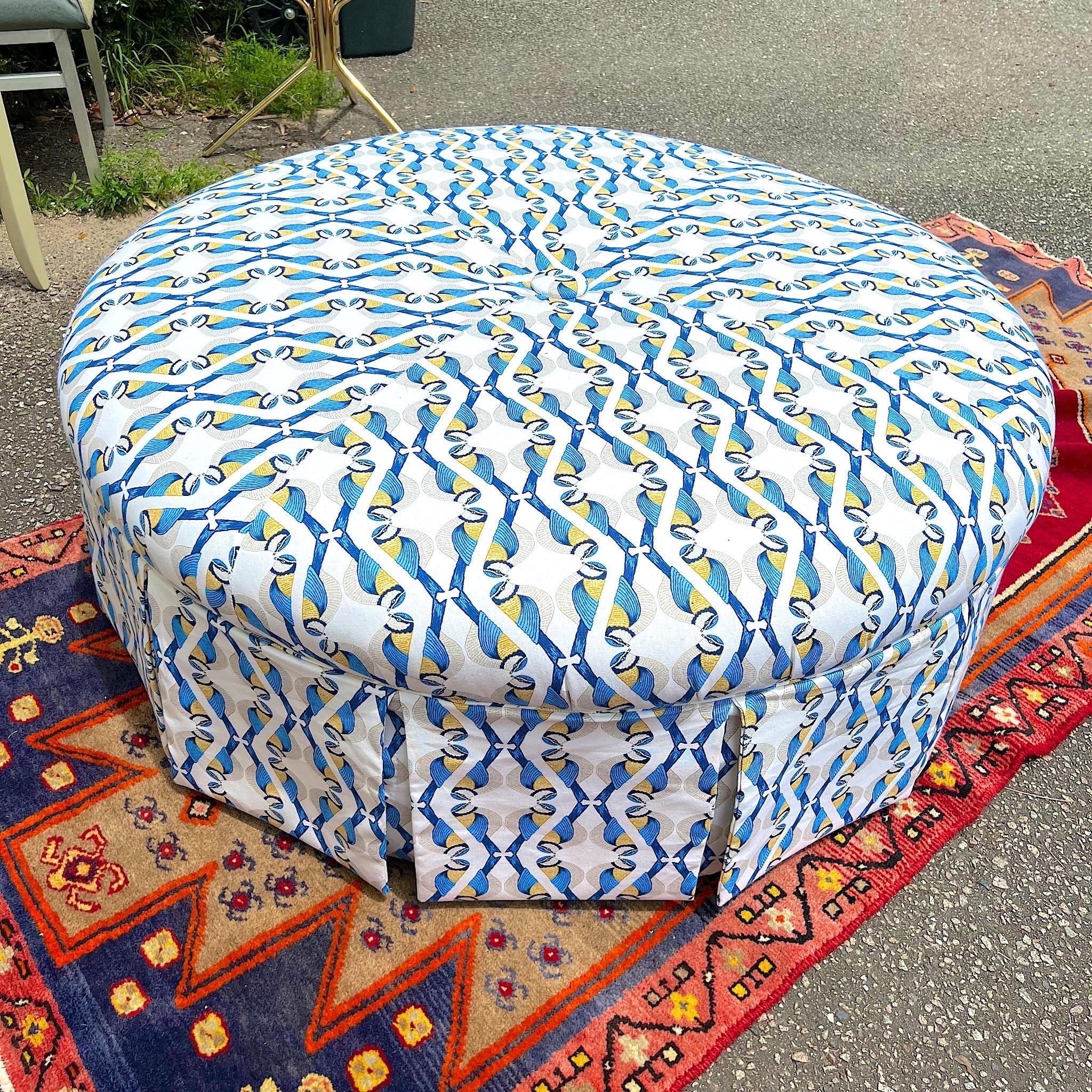 This pretty geometric bird fabric looks fabulous on this newly upholstered custom ottoman. With a pleated skirt, and one large button in the middle. This piece is fully upholstered. Oh and did I mention that this stunning piece of furniture is on