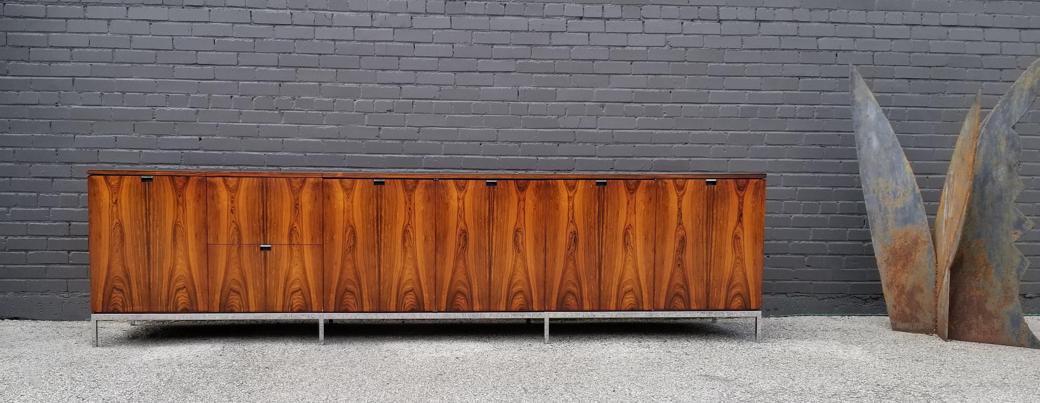 This monumentally proportioned media console was custom ordered by an east coast architect for his personal estate. It is much more generously proportioned than the average scale Knoll credenza. It is taller, deeper and much longer. The exotic
