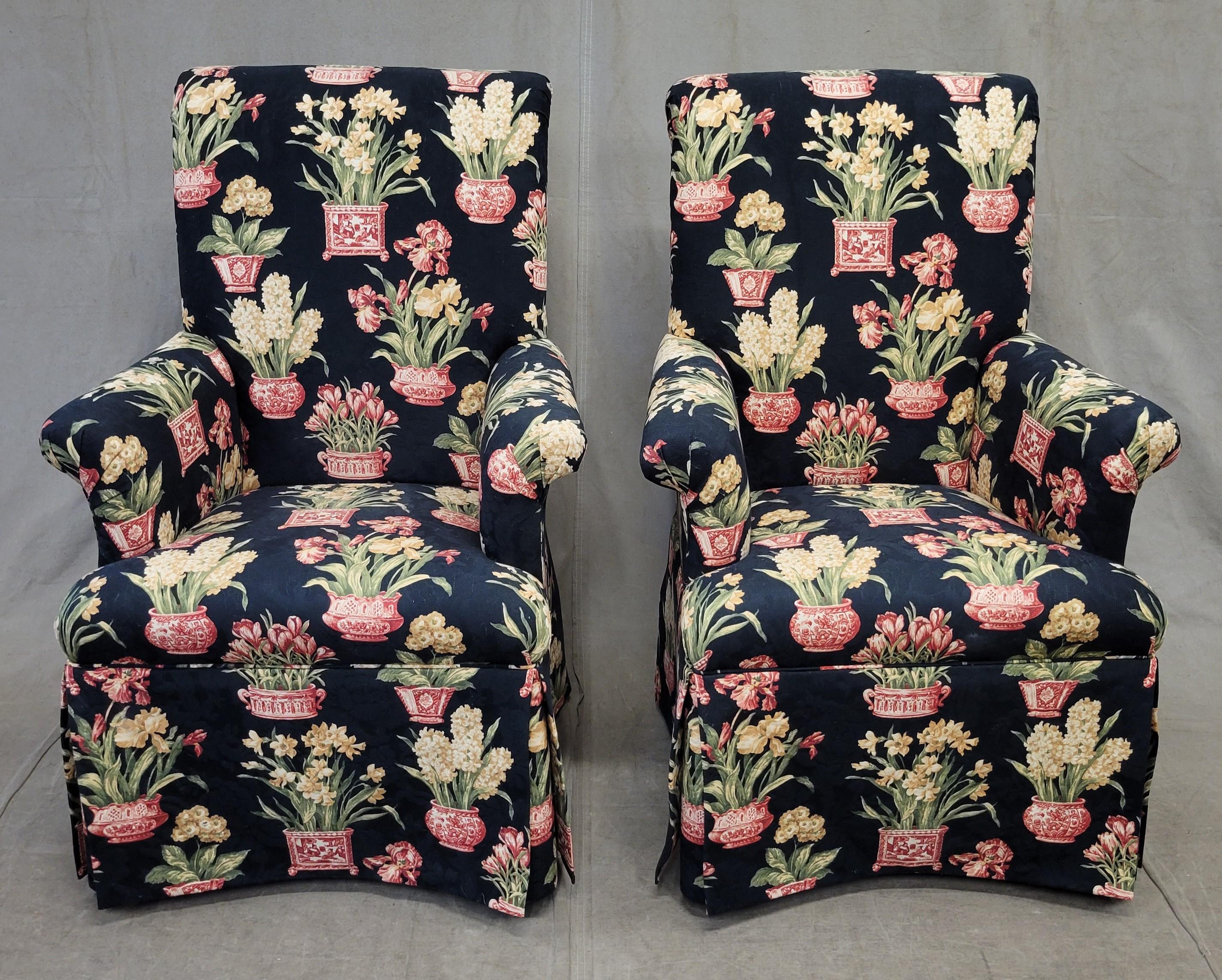 A charming pair of vintage custom Calico Corners petite botanical armchairs. Upholstered in a versatile heavy duty cotton fabric with green and cream iris, daffodils and hyacinths in deep pink Asian style pots contrast beautifully on a black