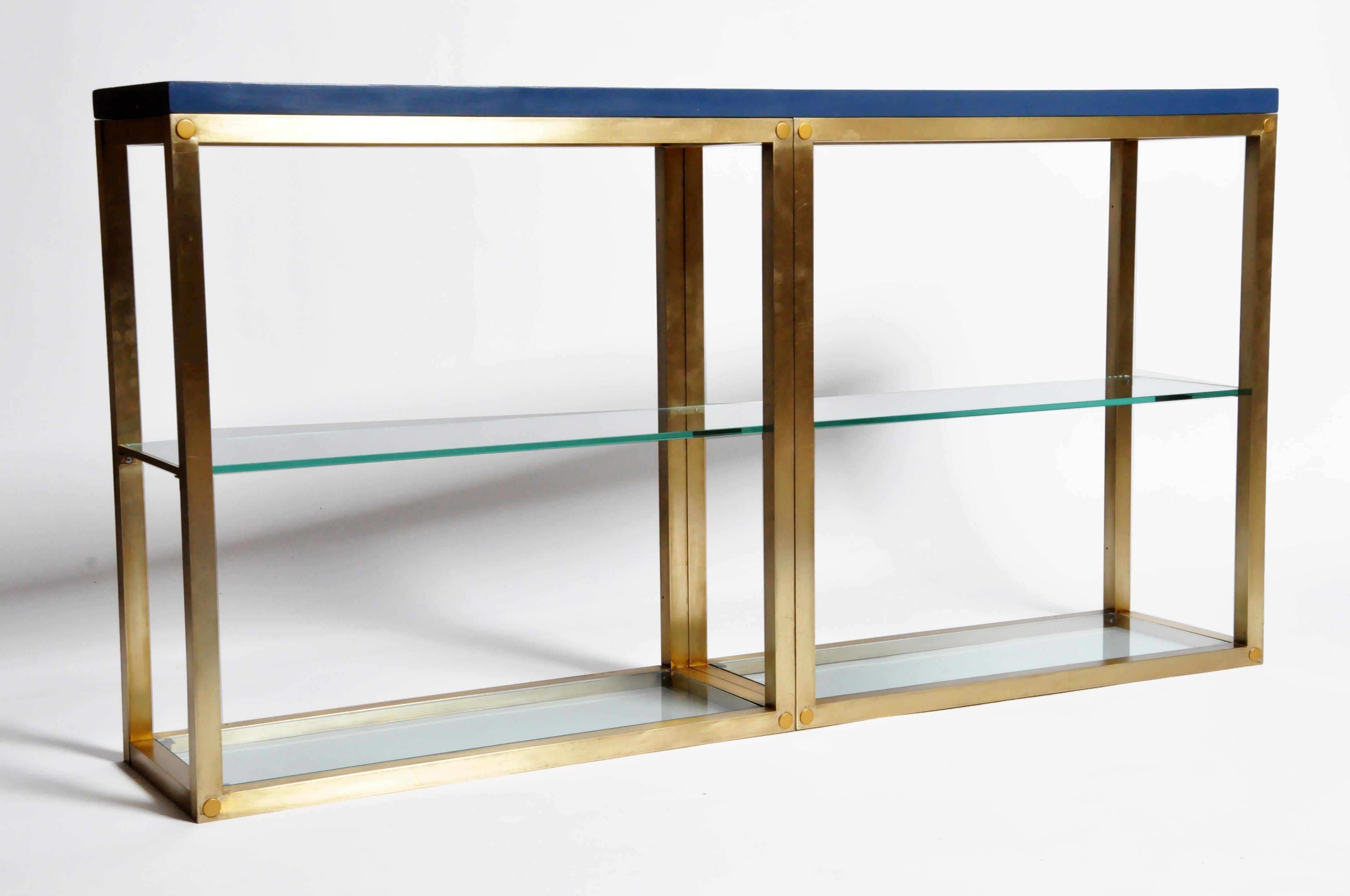 This 1960s vintage French brass base was mated to newly-fabricated lacquered wood top and glass shelves. Beautiful addition to add a pop of color to any room in your home.