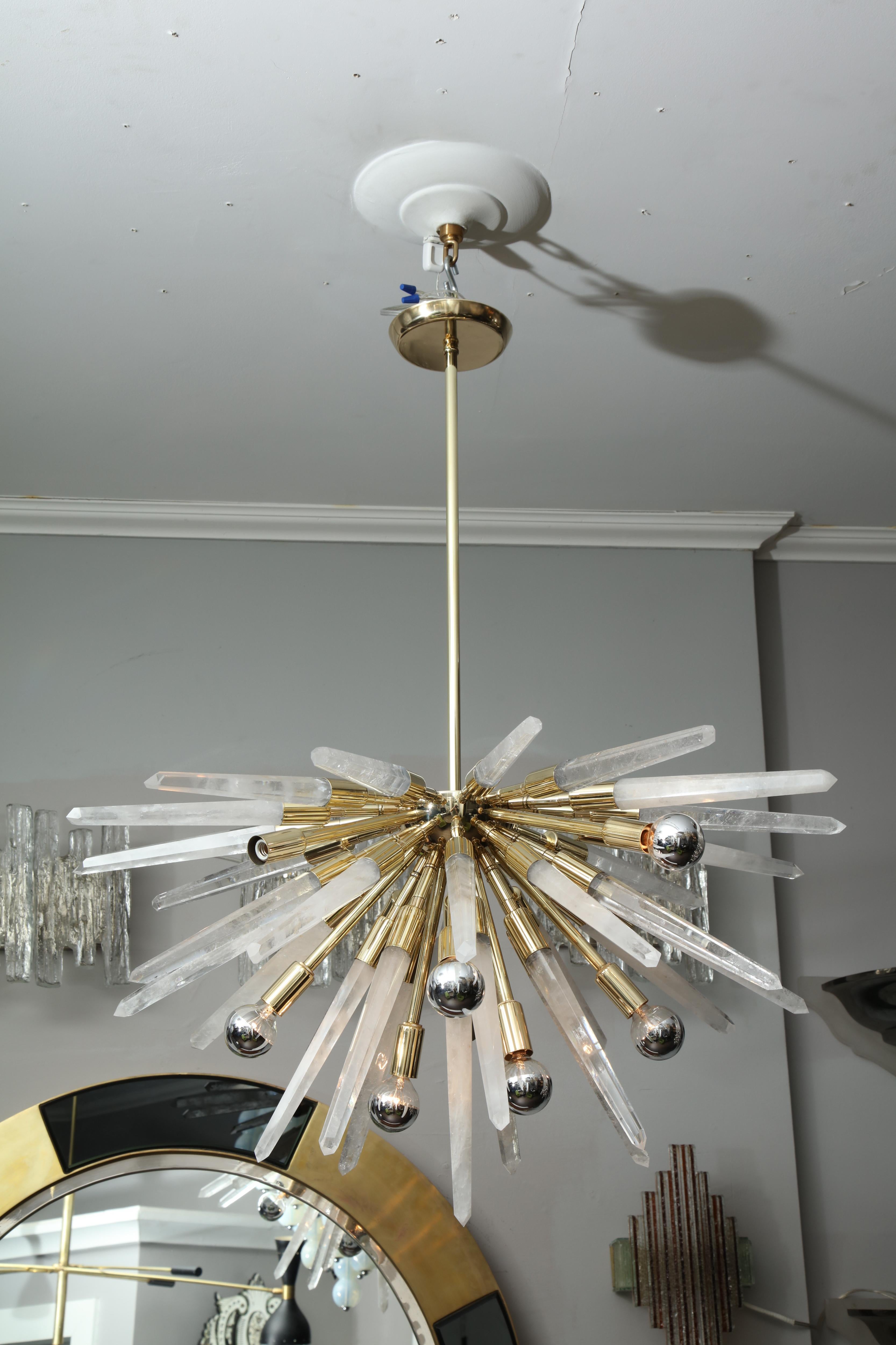 Custom Brazilian rock crystal half Sputnik chandelier. Customization is available in different sizes and finishes.
  