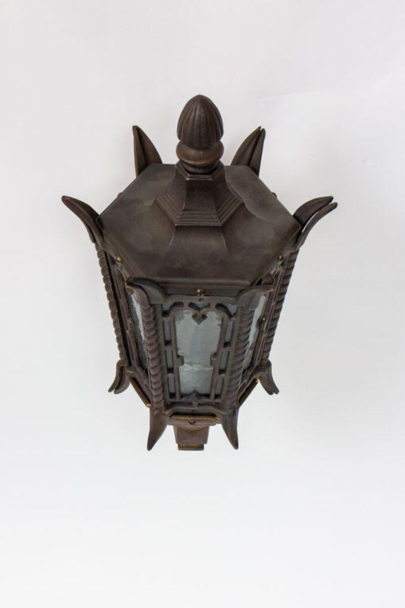 Custom bronze large exterior sconces. New, Solid bronze, recast from a cast iron piece c. 1910. Excellent durability, bronze can hold up to years of weathering.

Material: Glass, Bronze
Style: Gothic, Traditional
Place of Origin: United