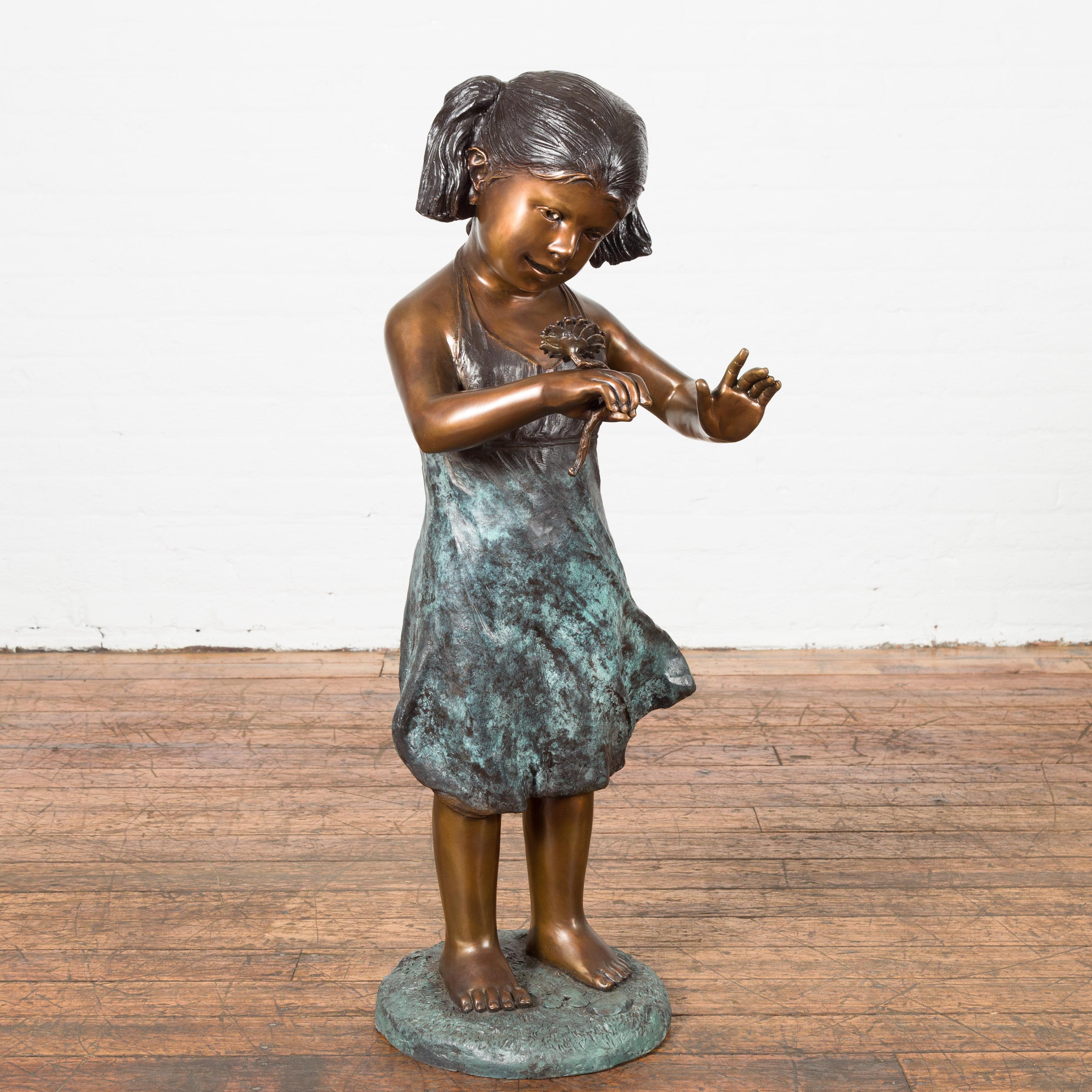 Bronze Garden Statue of a Girl Holding a Flower in Her Hand on Base For Sale 9