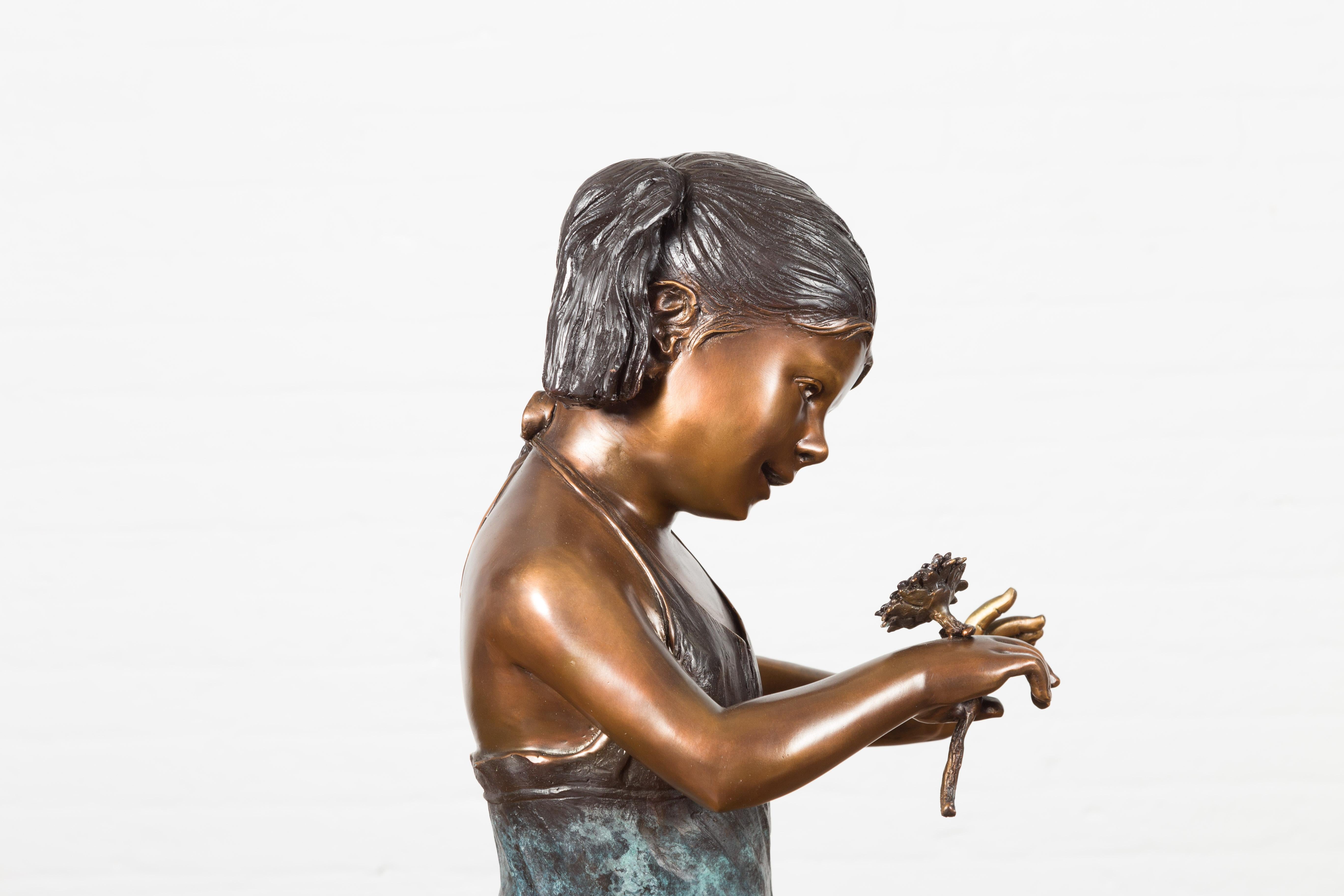 Bronze Garden Statue of a Girl Holding a Flower in Her Hand on Base For Sale 11