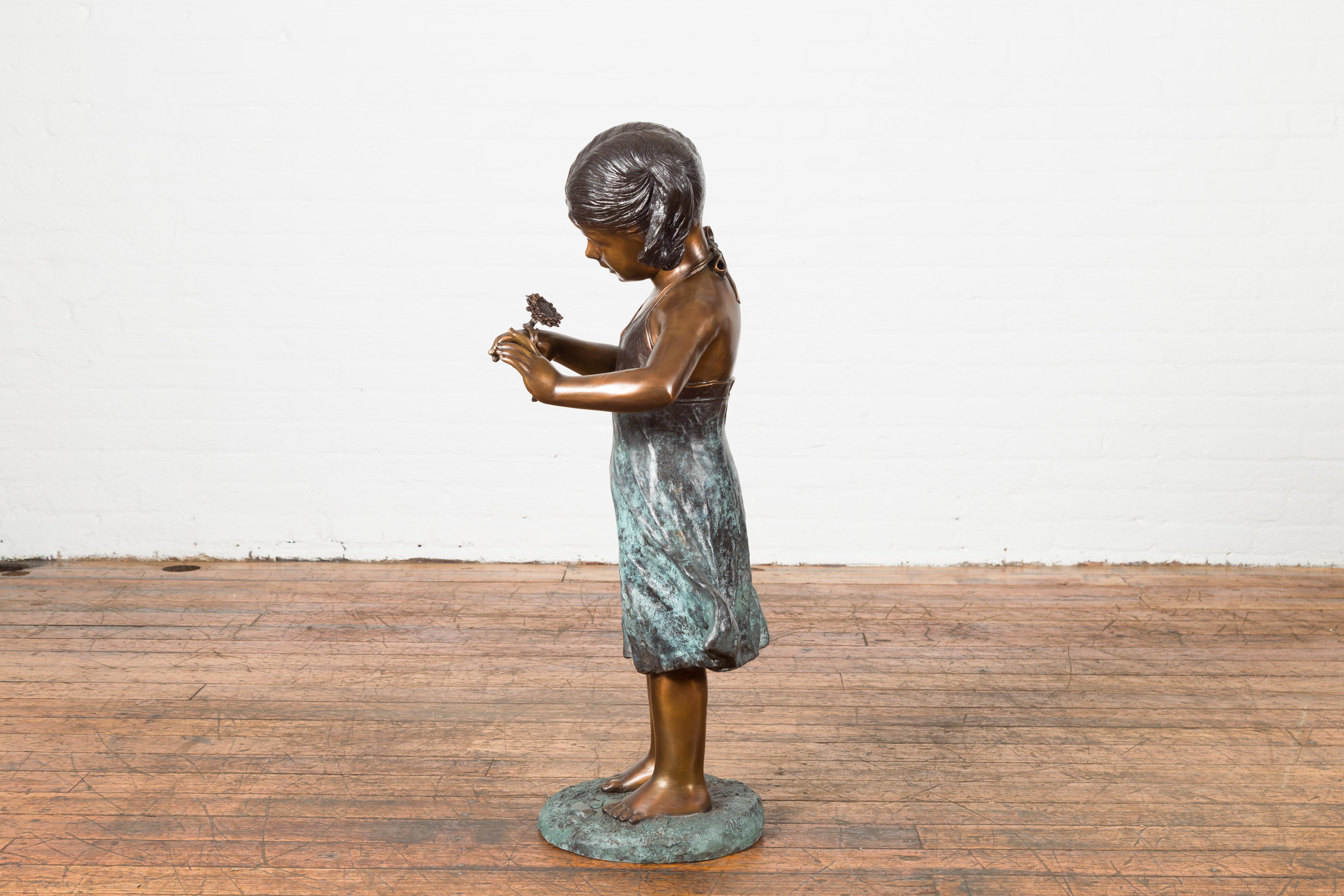 Bronze Garden Statue of a Girl Holding a Flower in Her Hand on Base For Sale 14