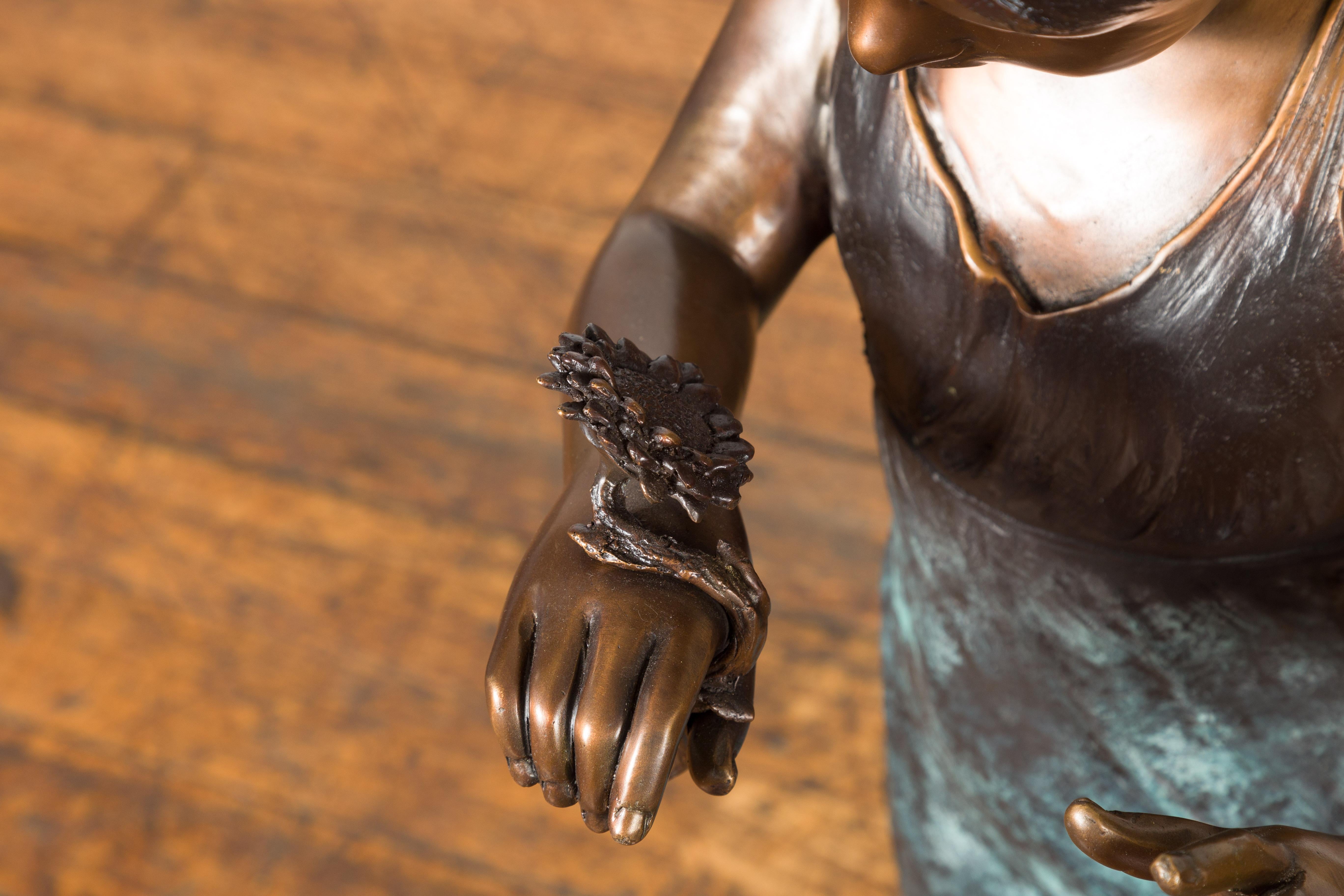 Bronze Garden Statue of a Girl Holding a Flower in Her Hand on Base For Sale 1