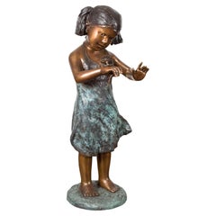 Bronze Garden Statue of a Girl Holding a Flower in Her Hand on Base