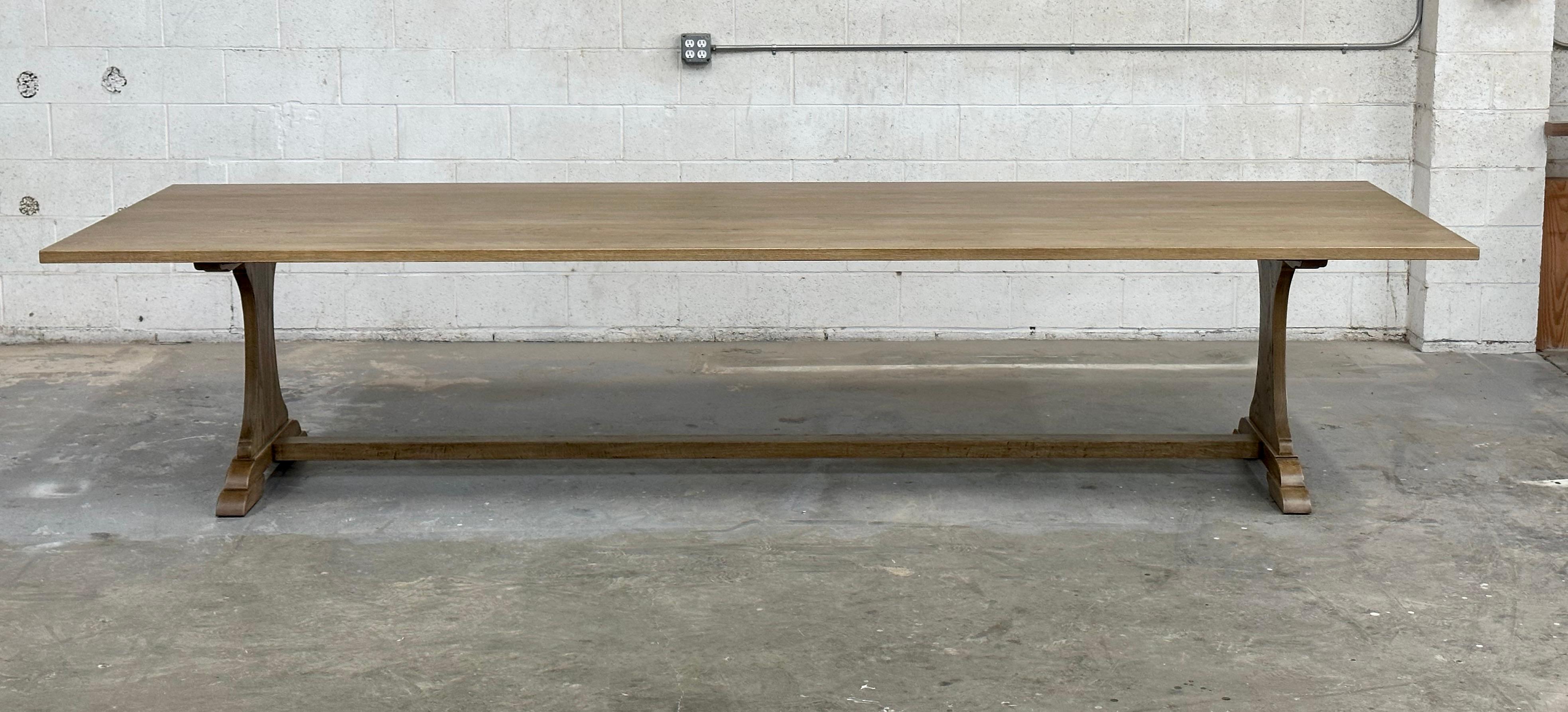 This rustic oak dining table is seen here in 144