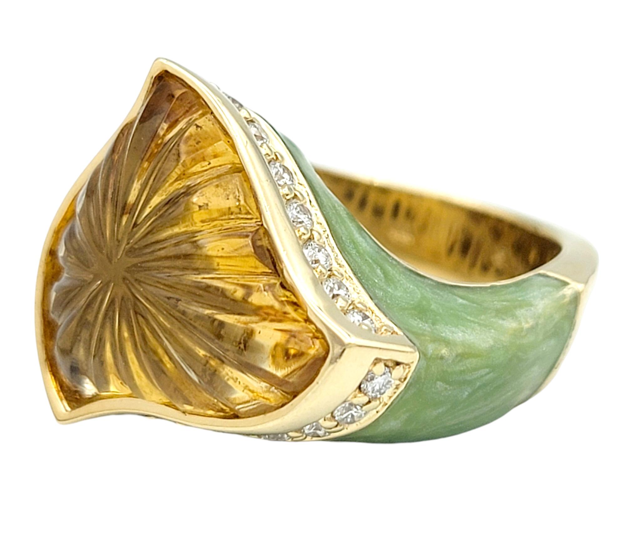 Ring Size: 6.75

Unveil a world of enchanting beauty with this one-of-a-kind carved citrine ring, a true testament to artistic design and craftsmanship. The mesmerizing citrine, with its warm golden glow, is intricately carved to create a