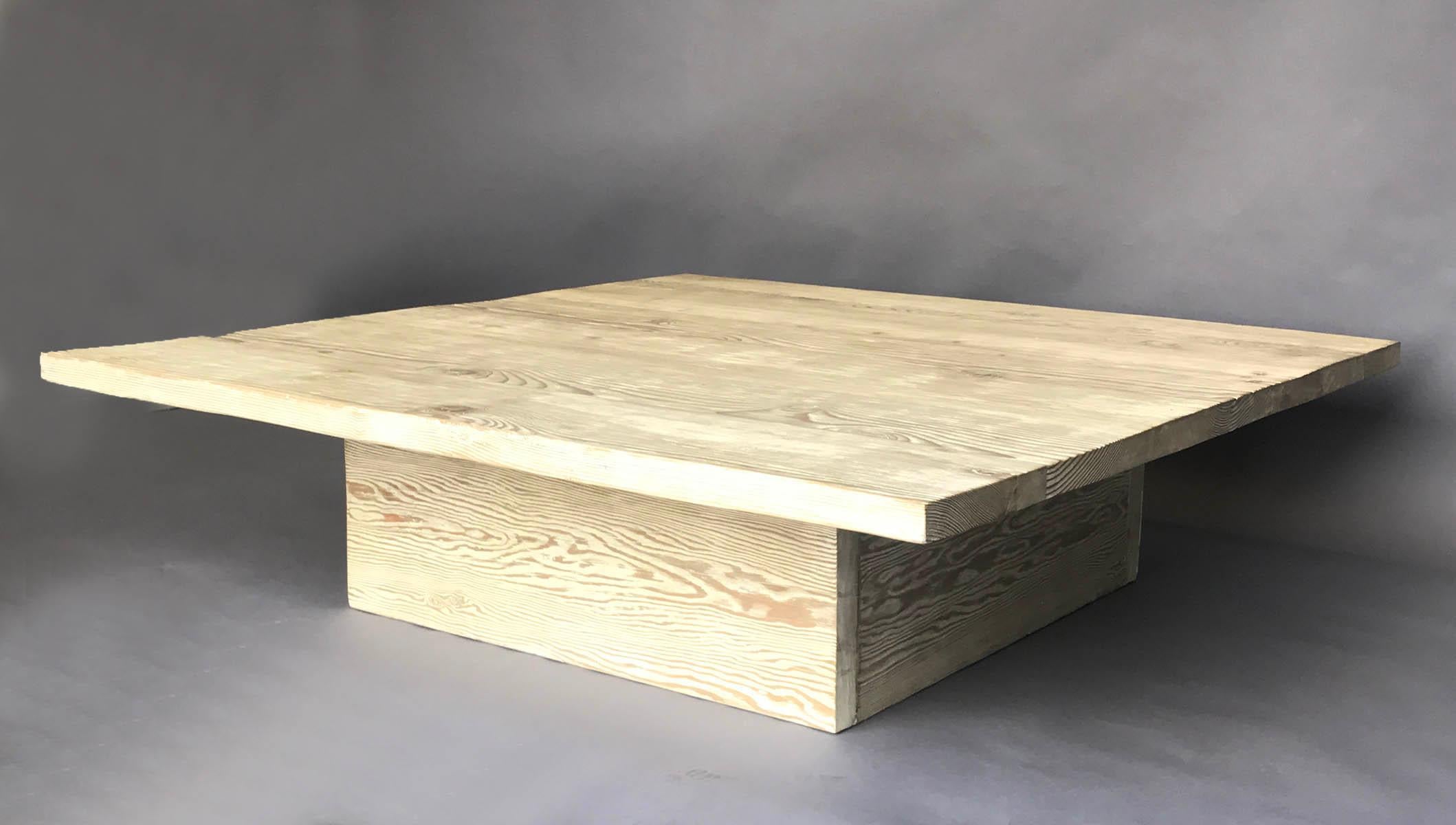 Custom doug fir  wood coffee table shown in Dos Gallos finish dead flat ceruse. Reclaimed Douglas fir may show natural cracks, knots and nail holes but once it has a finish, it is always smooth to the touch.
Made in Los Angeles by Dos Gallos Studio.