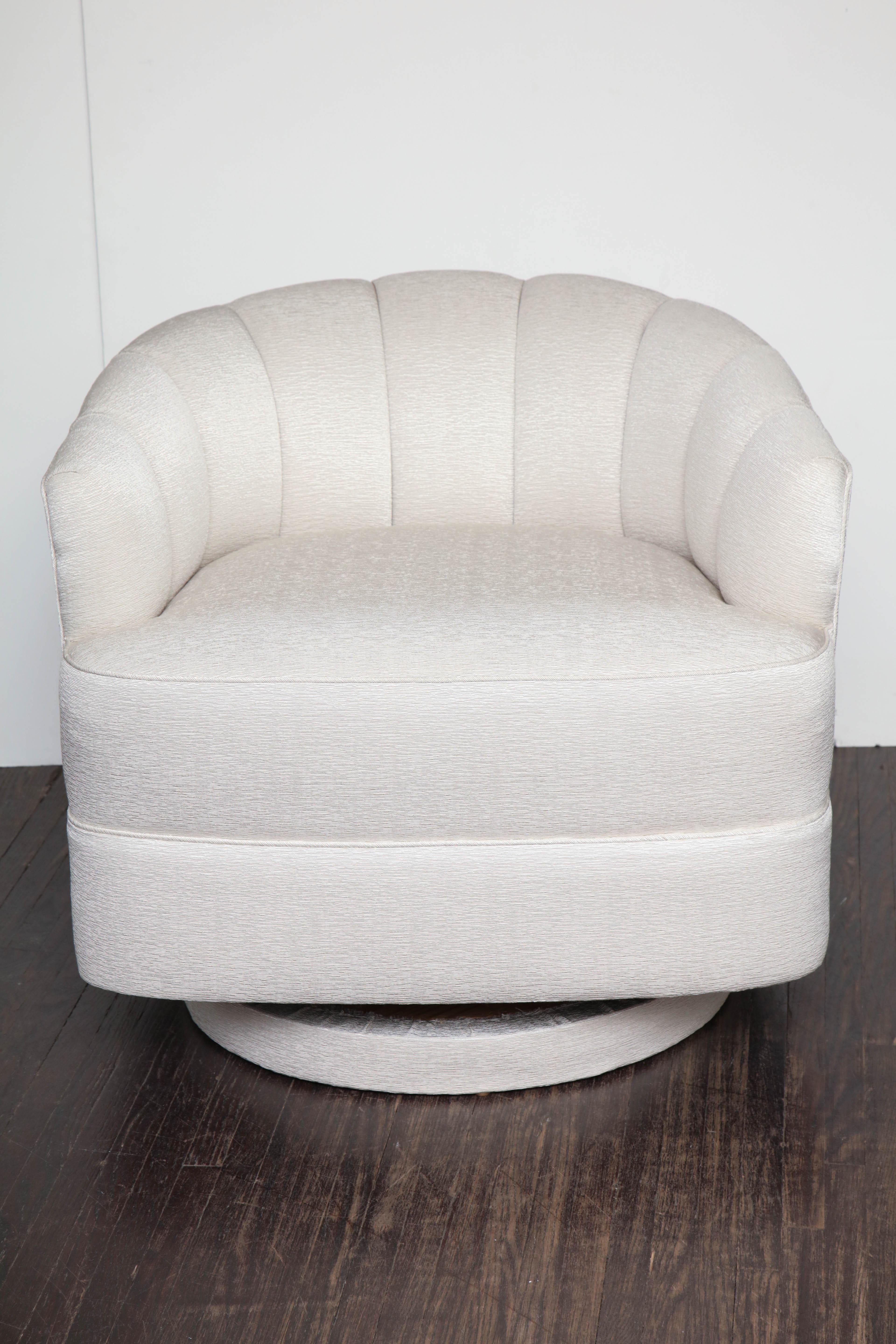 Custom champagne swivel chair. Customization is available in different fabric (COF).