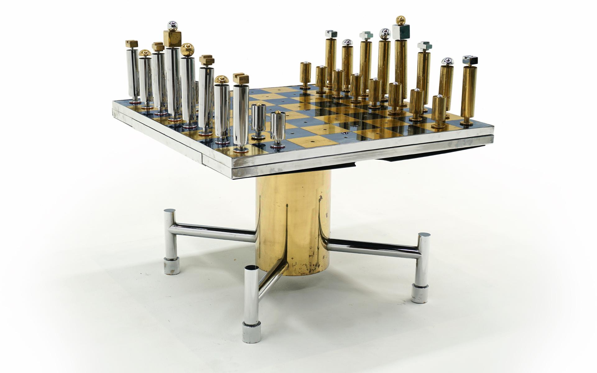 Over the top, super cool, chess and checkers custom made table with pieces.  The pieces insert into the holes on the table as seen in the photos.  A drawer on each side houses the checkers pieces.  The drawer on each players side is where you place