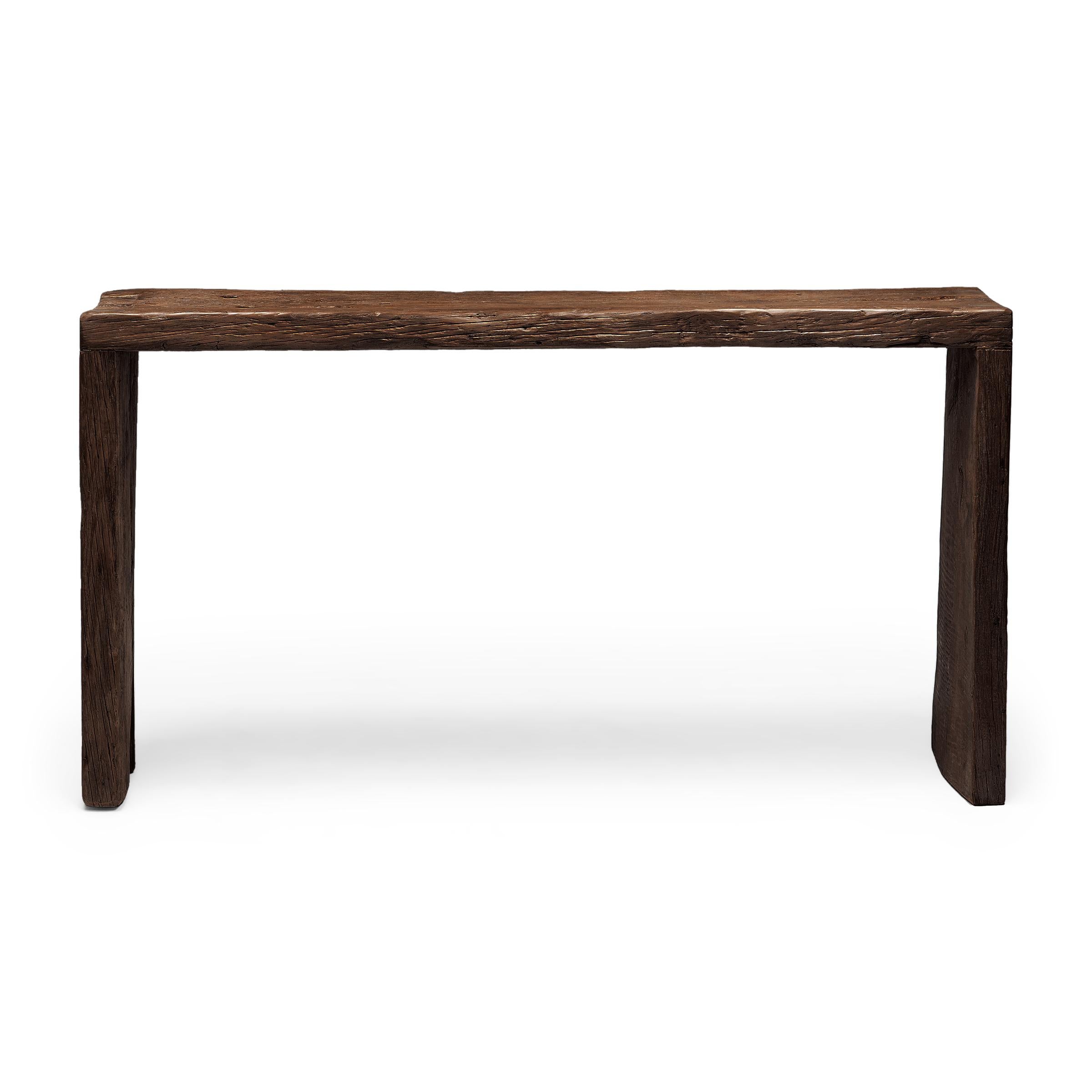 Our custom reclaimed wood console tables are hand-crafted by local artisans using architectural salvage from Qing-dynasty buildings. Each table is expertly crafted to a minimalist, waterfall design with traditional dovetailed joinery, without a