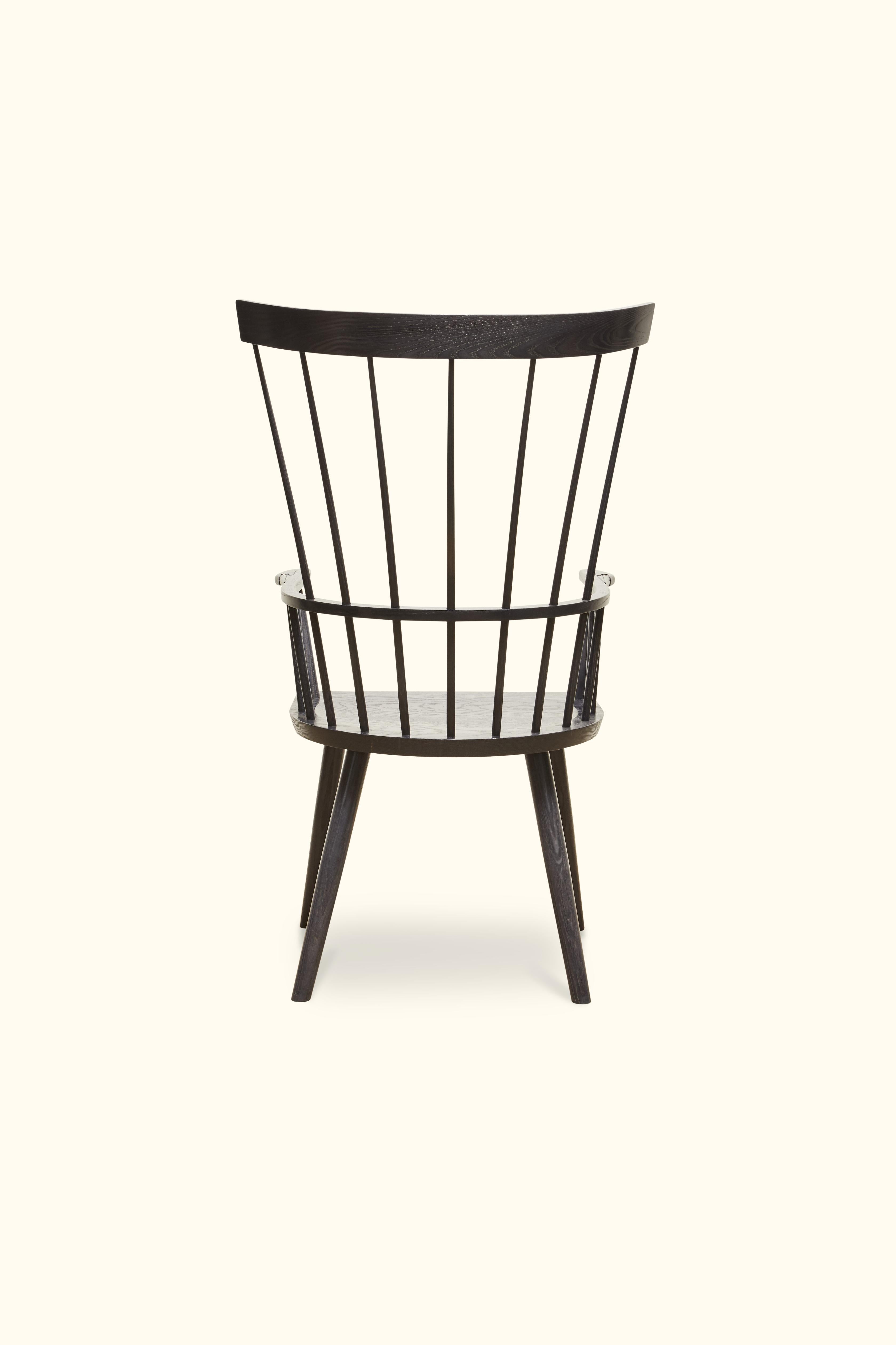 Hand carved crane heads have been added to the arms of this one of a kind chair. The colt high-back armchair is generous in scale with a comfortably deep seat and supportive flexible back a signature feature of all Classic Windsor chairs making it