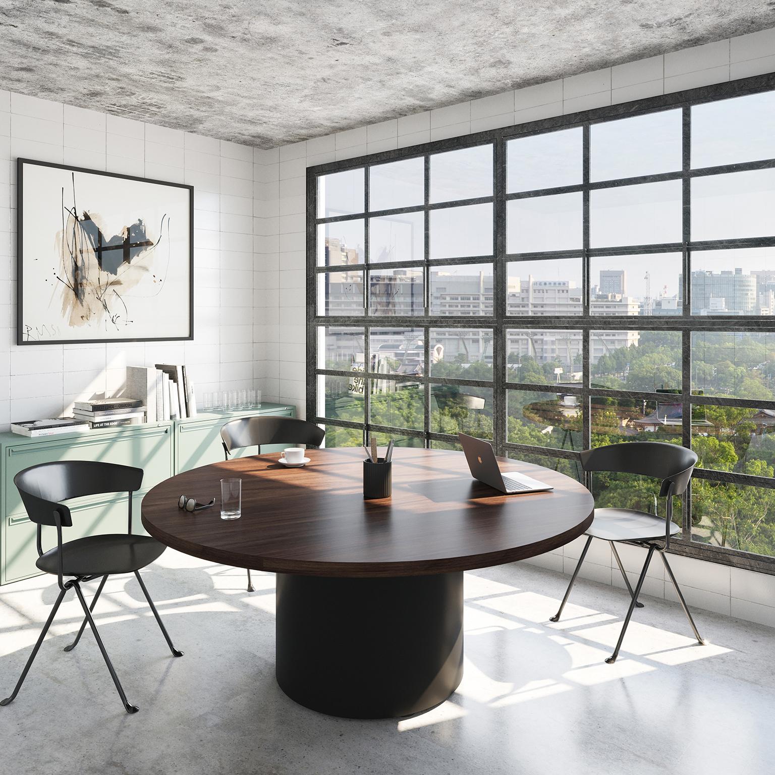 The Column table is a modern round meeting table that proves there's beauty in simplicity.

Its clean geometric lines happen to be highly functional, providing more legroom (and seats) around the pedestal base and allowing the table to fit into