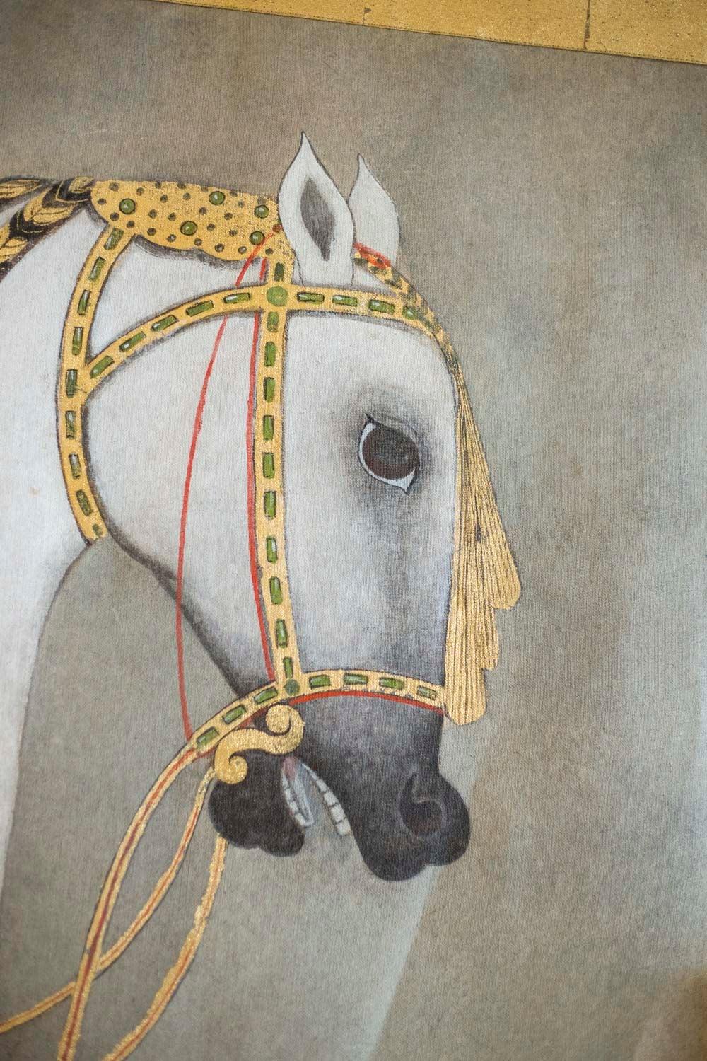 Consolidated Listing for the following two items: 
LU959119336052
LU959119336122

Painted canvas figuring a side view white and orange Arabian horse with dark braided mane with gilt strands. It is adorned with small orange leaves on its chest and