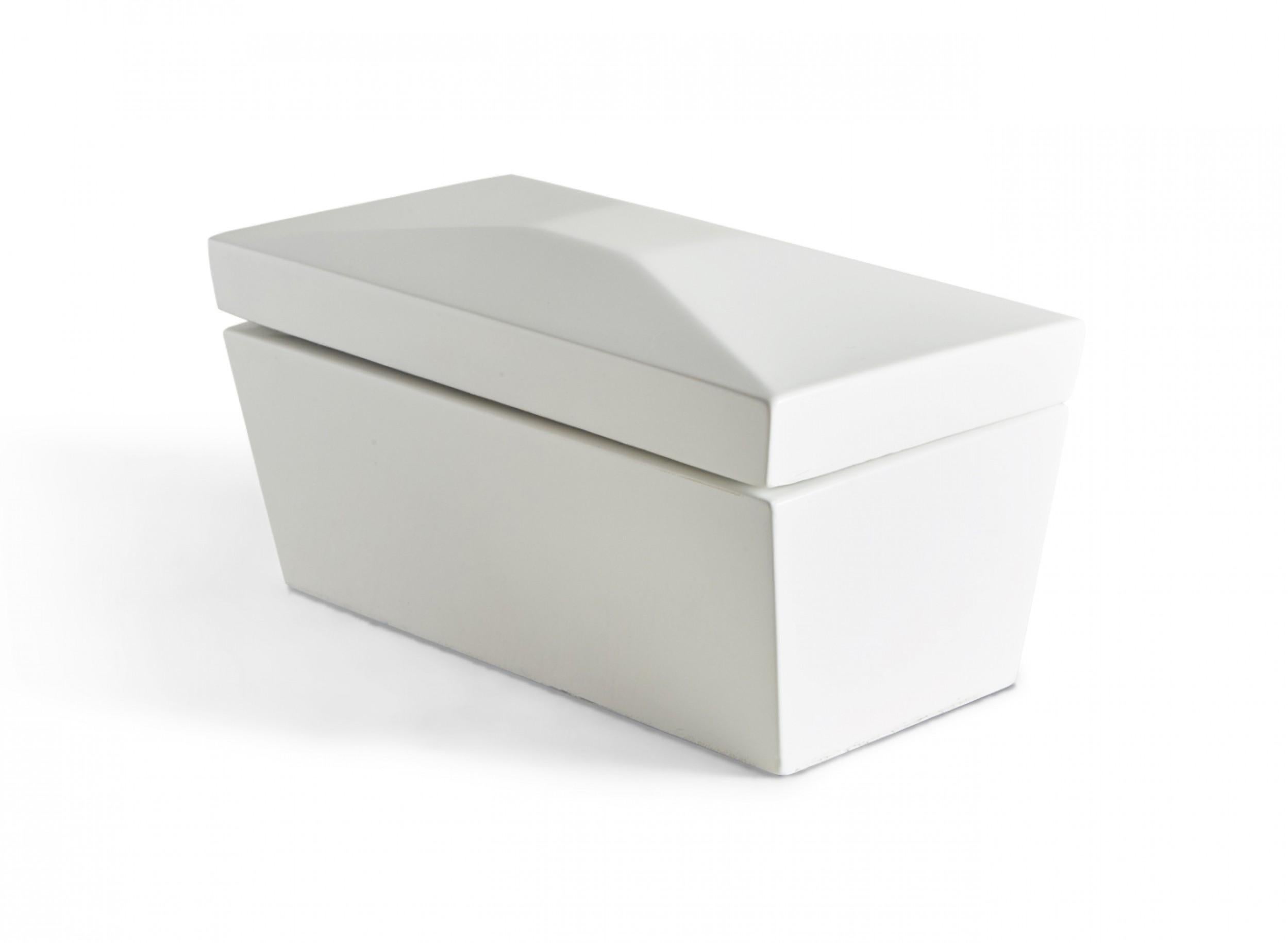 Contemporary decorative wooden box with a white lacquer finish, a rectangular profile with faceted lid and tapered sides, and a brass-hinged lid that opens to reveal two interior compartments covered with white lacquered wooden square lids with