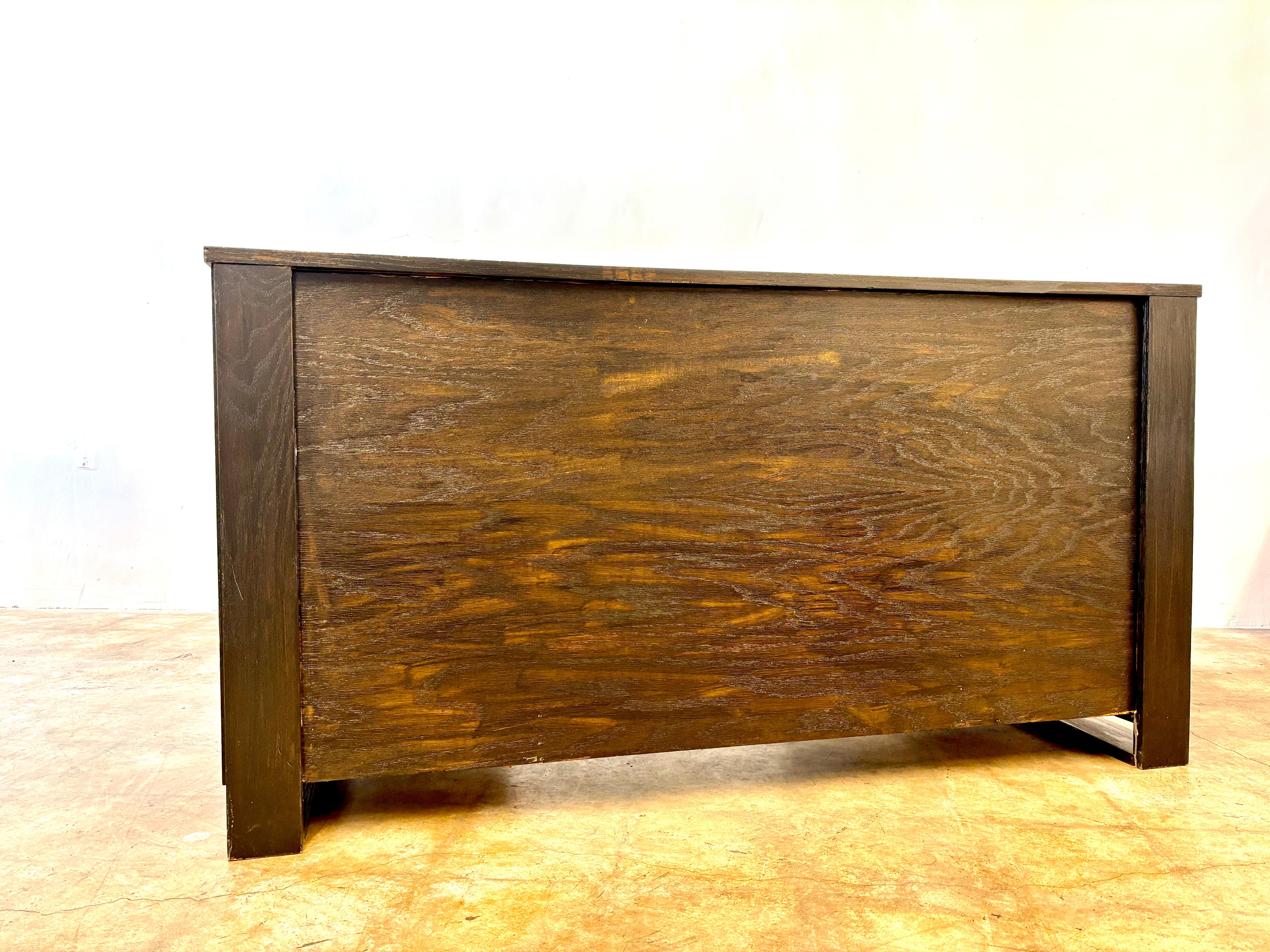 Modern Craftsman style custom made oak desk. Newly ebonized and laquered.  Chunky vertical drawer pulls.  Great compact size for small spaces.  Computer , writing desk or creative work table.   Excellent value for the price! 
Built to last

57