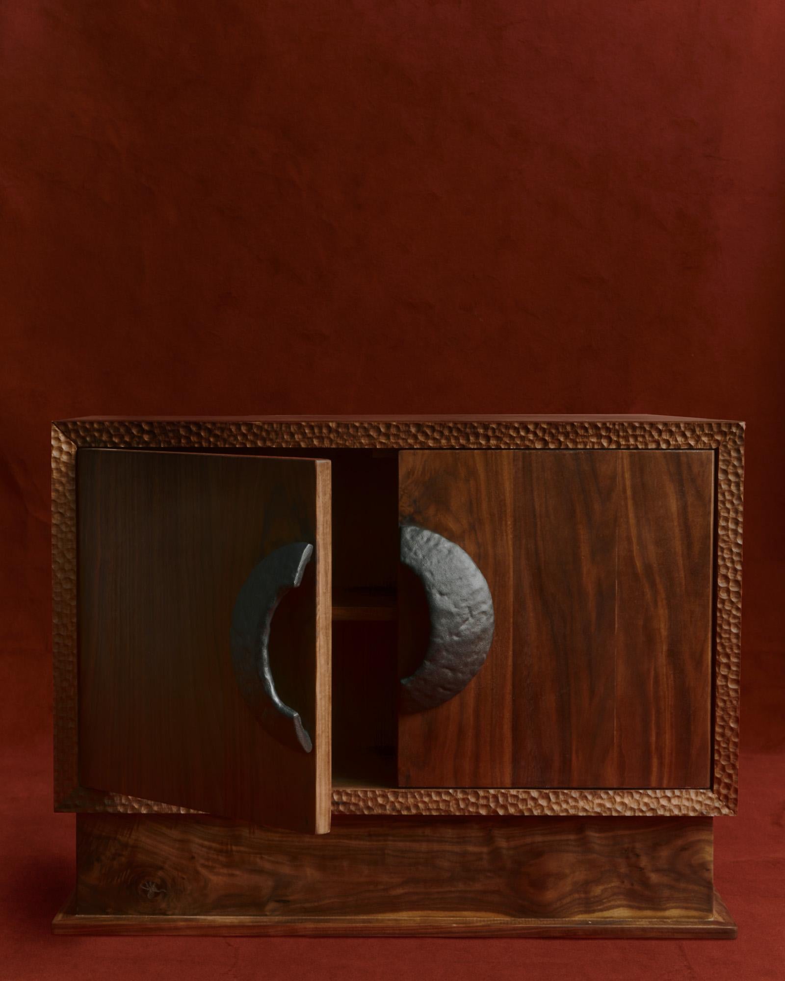 Custom handmade credenza in solid walnut. Featuring dovetail joints and hand gauged bevels.

This item is highly customizable and is available in a wide range of woods, sizes, and layouts.

Serra Hardware products are characterized by their crude