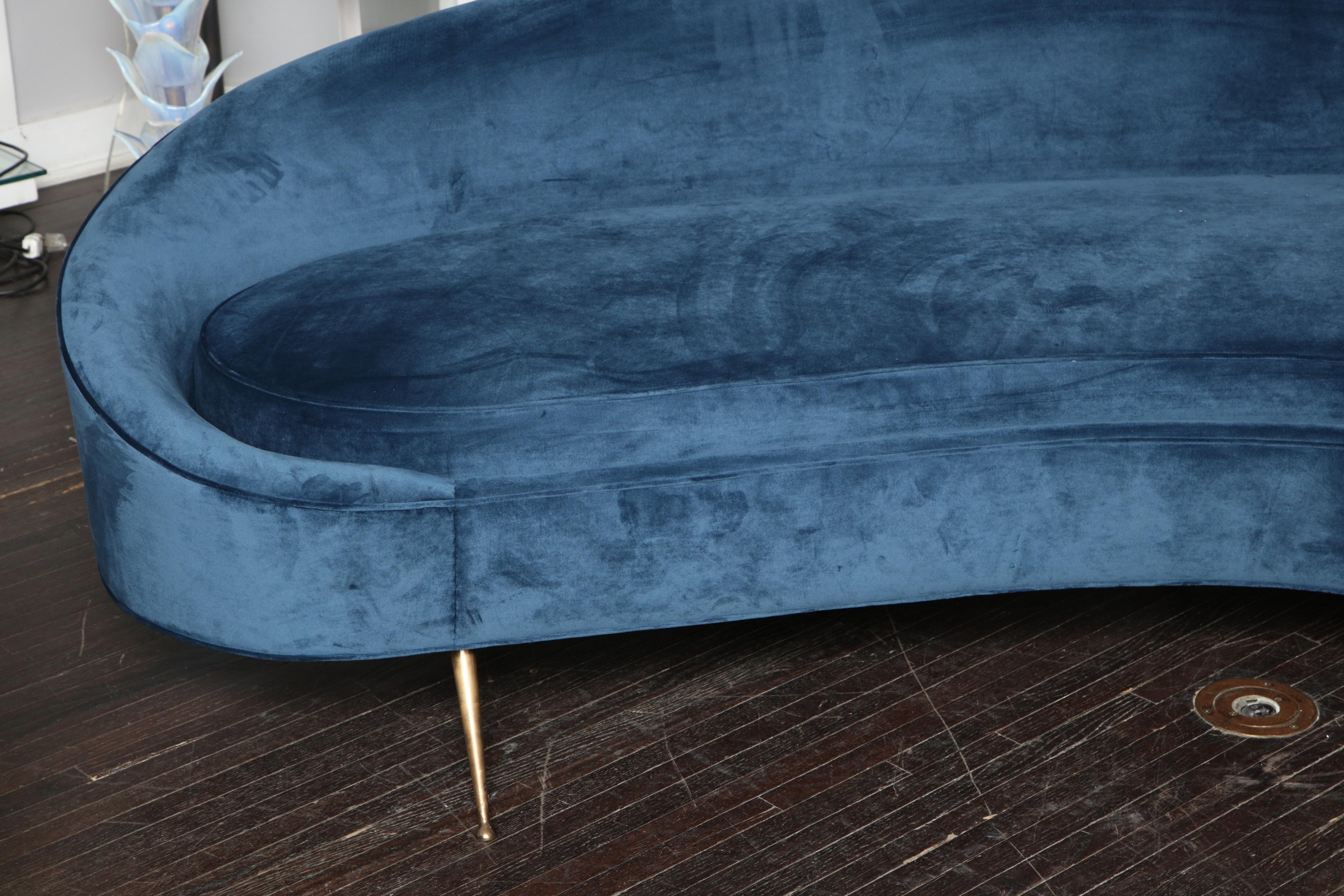blue velvet curved sofa