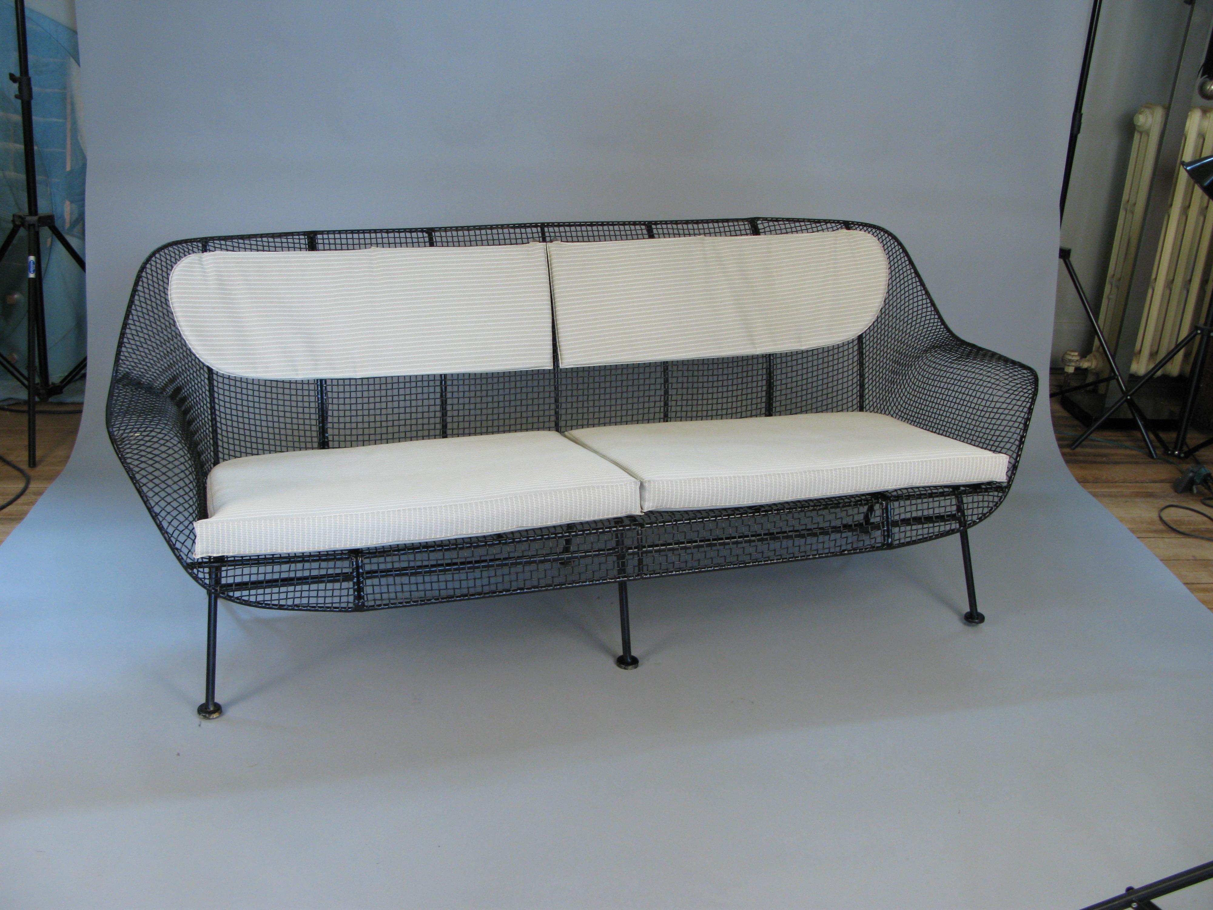 custom cushion sets (seat and back) for the woodard sculptura settee and the woodard sofa, in sunbrella white 57003-0000. to be delivered with the pieces.
(images are of vintage cushions - color pictured is not indicative of sunbrella white