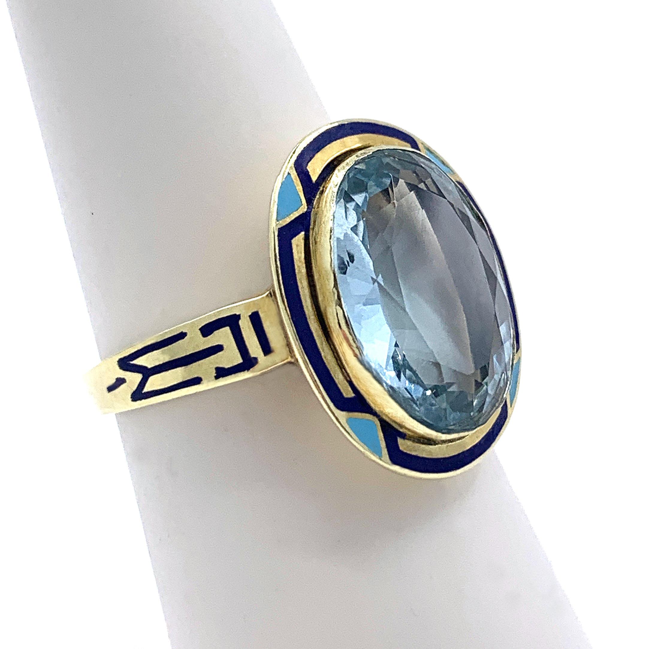 Eytan Brandes had a sparkling, natural and untreated aquamarine cut specifically for this interesting 14 karat gold and enamel setting.  The setting originally came to us with a damaged lapis.  We think it's American, and from the turn of the 19th