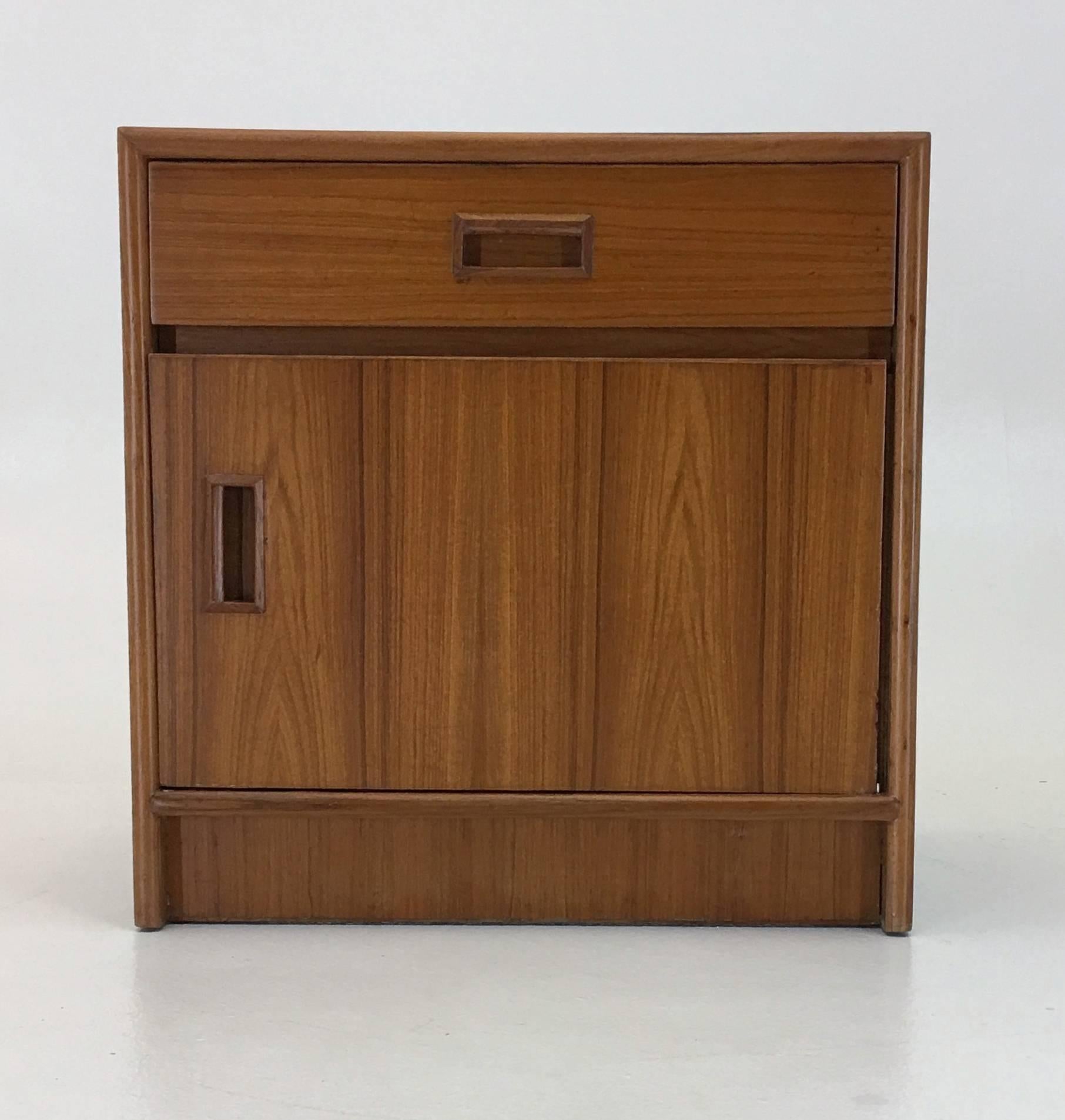 Denmark, circa 1970. Teak. Designer and cabinetmaker unknown, in the style of Børge Mogensen Each measures: 20 wide x 20.25 tall x 16.25 inches deep
Each unit has a slide out drawer and pull door connected with piano hinges. The condition is good
