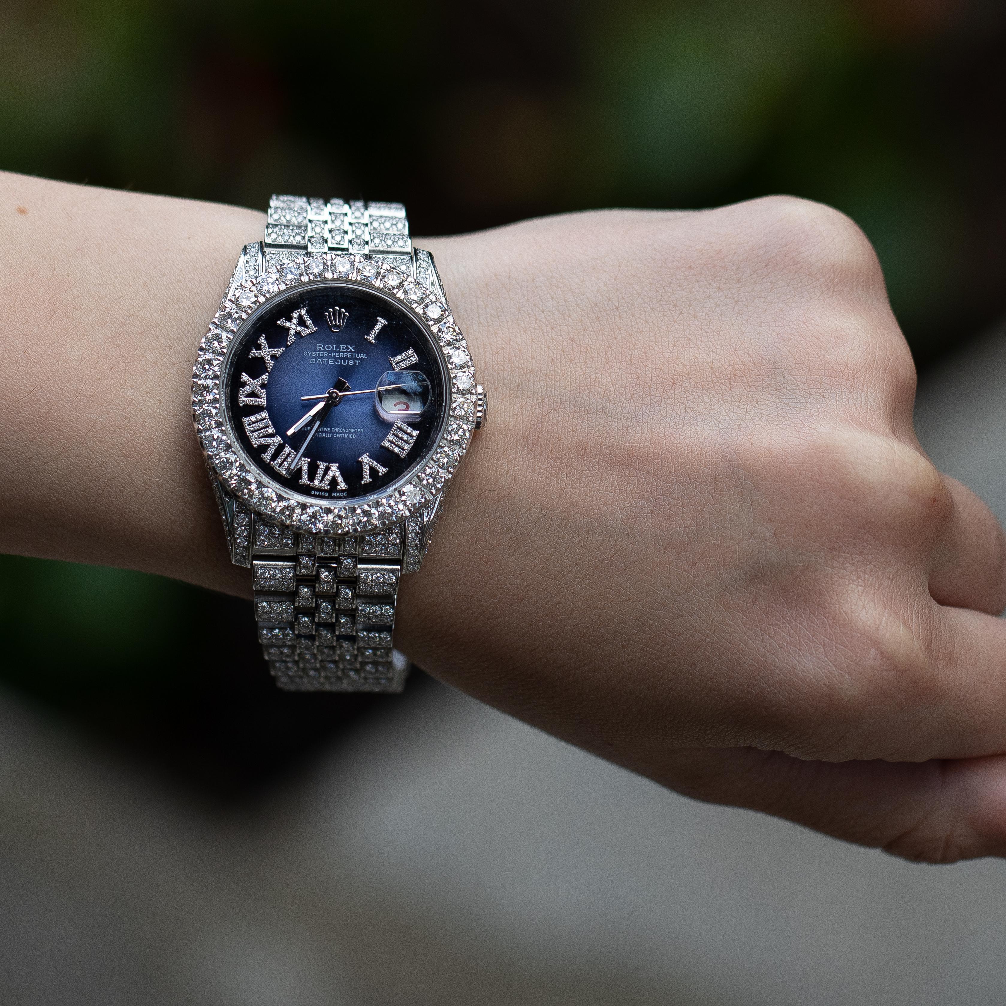 Elegant Rolex Watch Custom Designed with 21 Carats of High-Quality Diamonds. Both Timeless and Beautiful makes this a Timepiece that will both keep you timely and radiant. 
Rolex Watch
Custom Made 
21 Carats Diamonds
( Color: F, Clarity: VS )